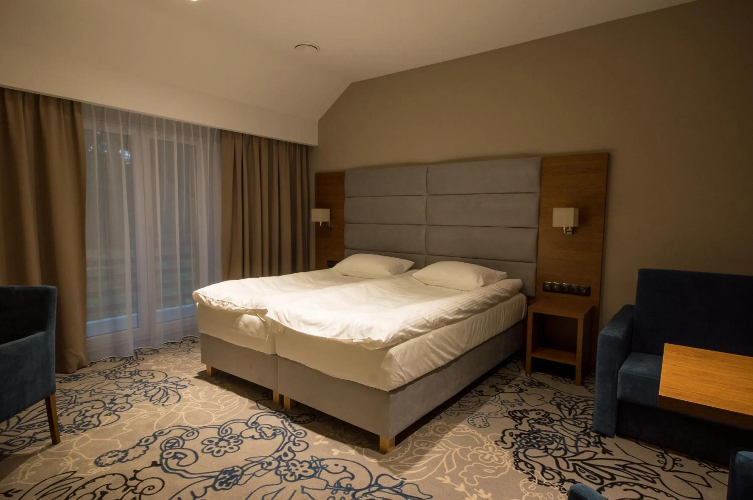 Bed in Rezydencja Sosnowa Luxury Hotel