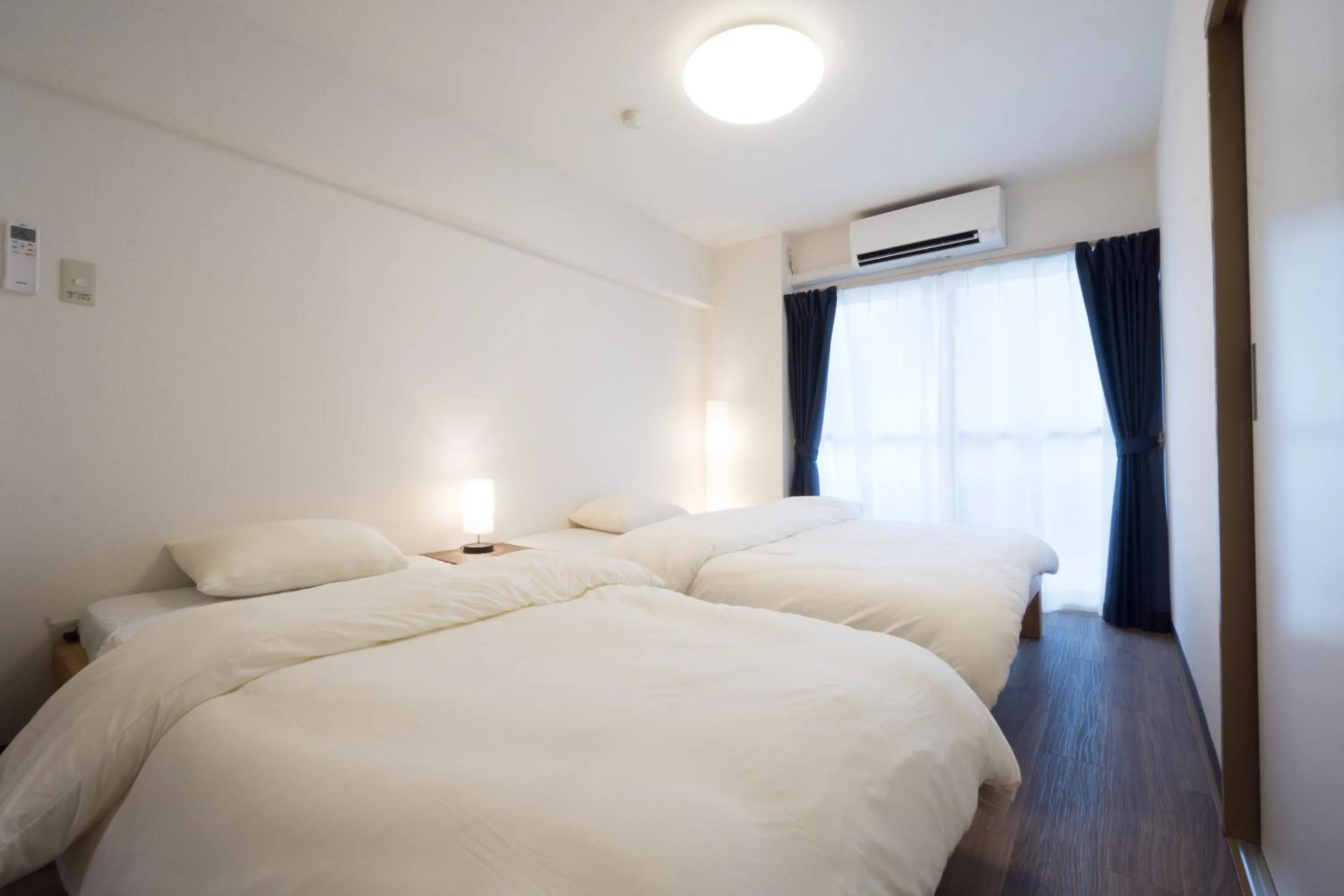 Bed in GOEN inn Tokyo