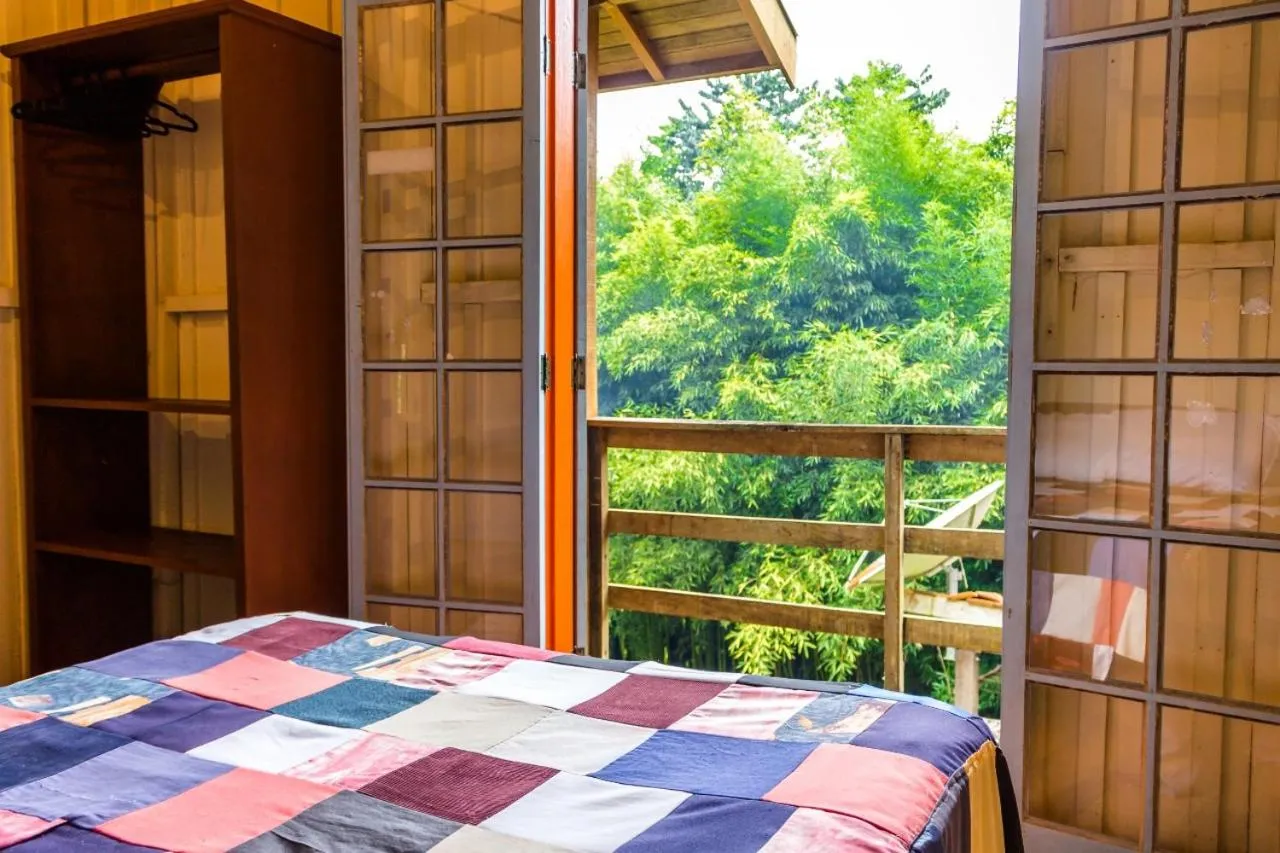 Bed in Pousada Trem das Cores
