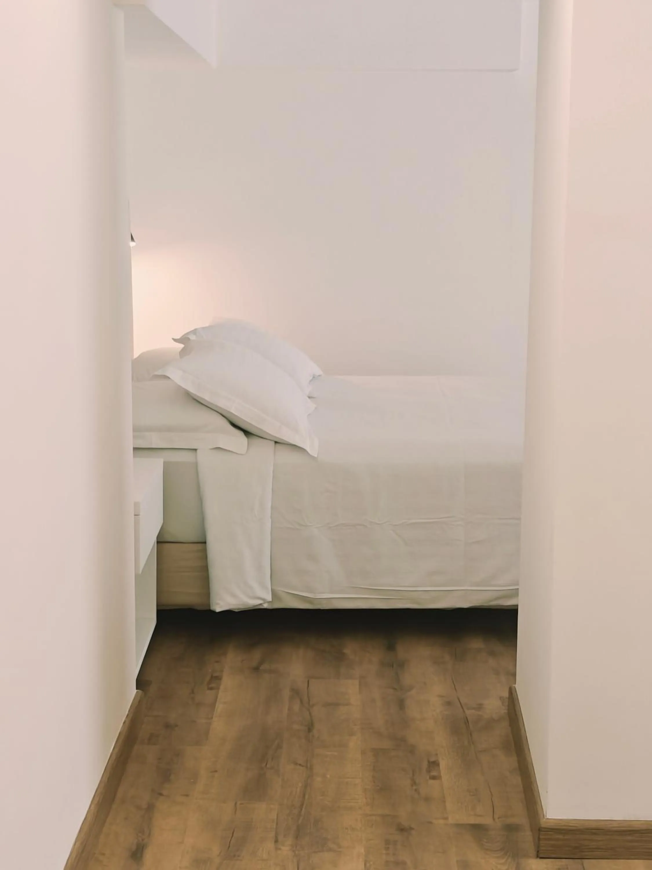 Bed in Ibiscus Hotel