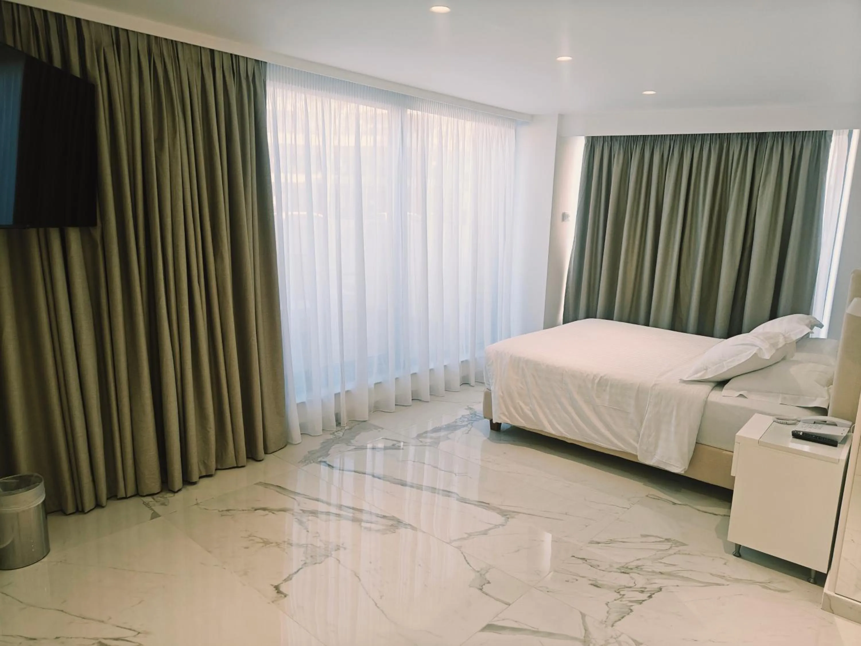 Bed in Ibiscus Hotel