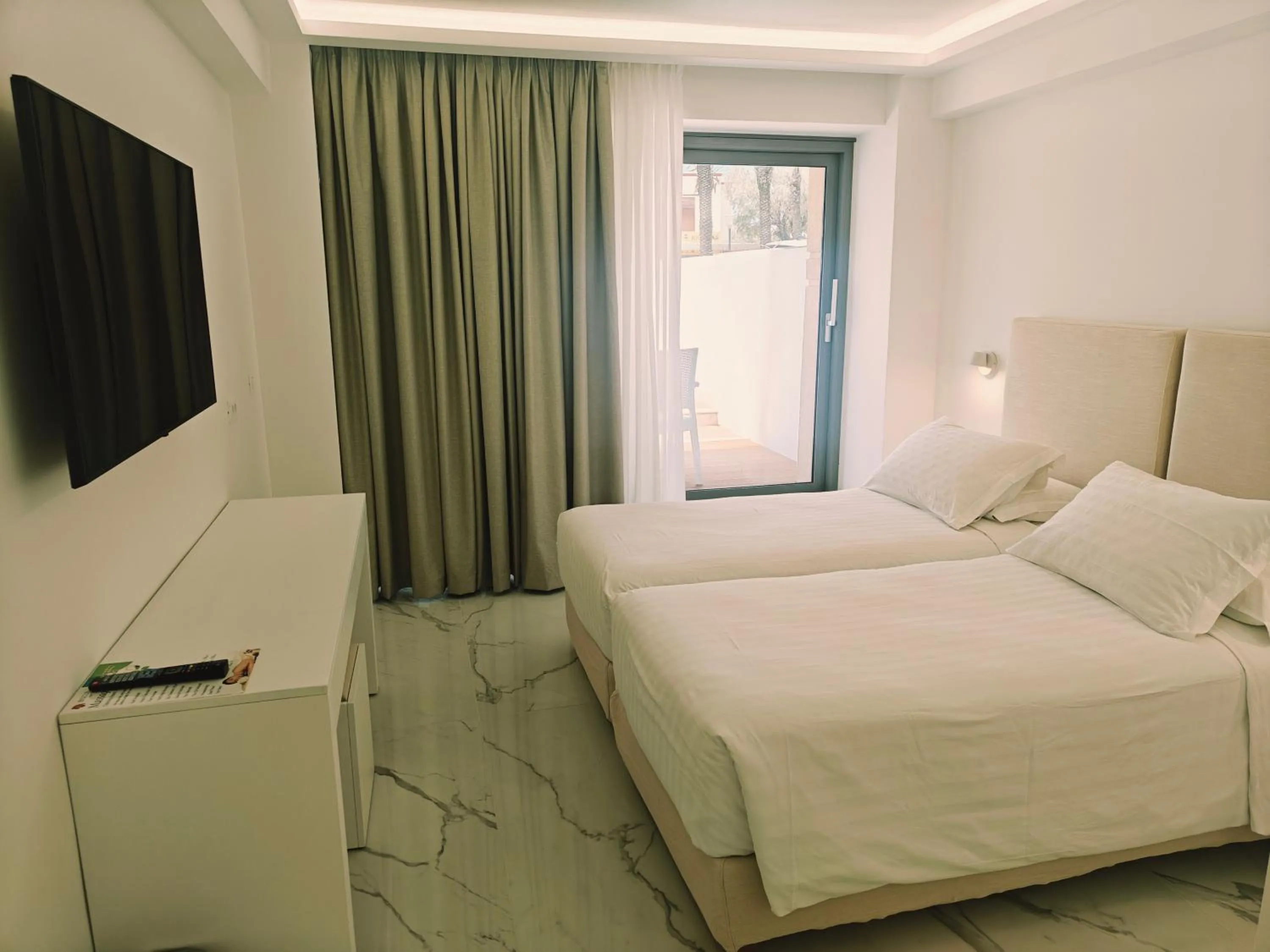 Bed in Ibiscus Hotel