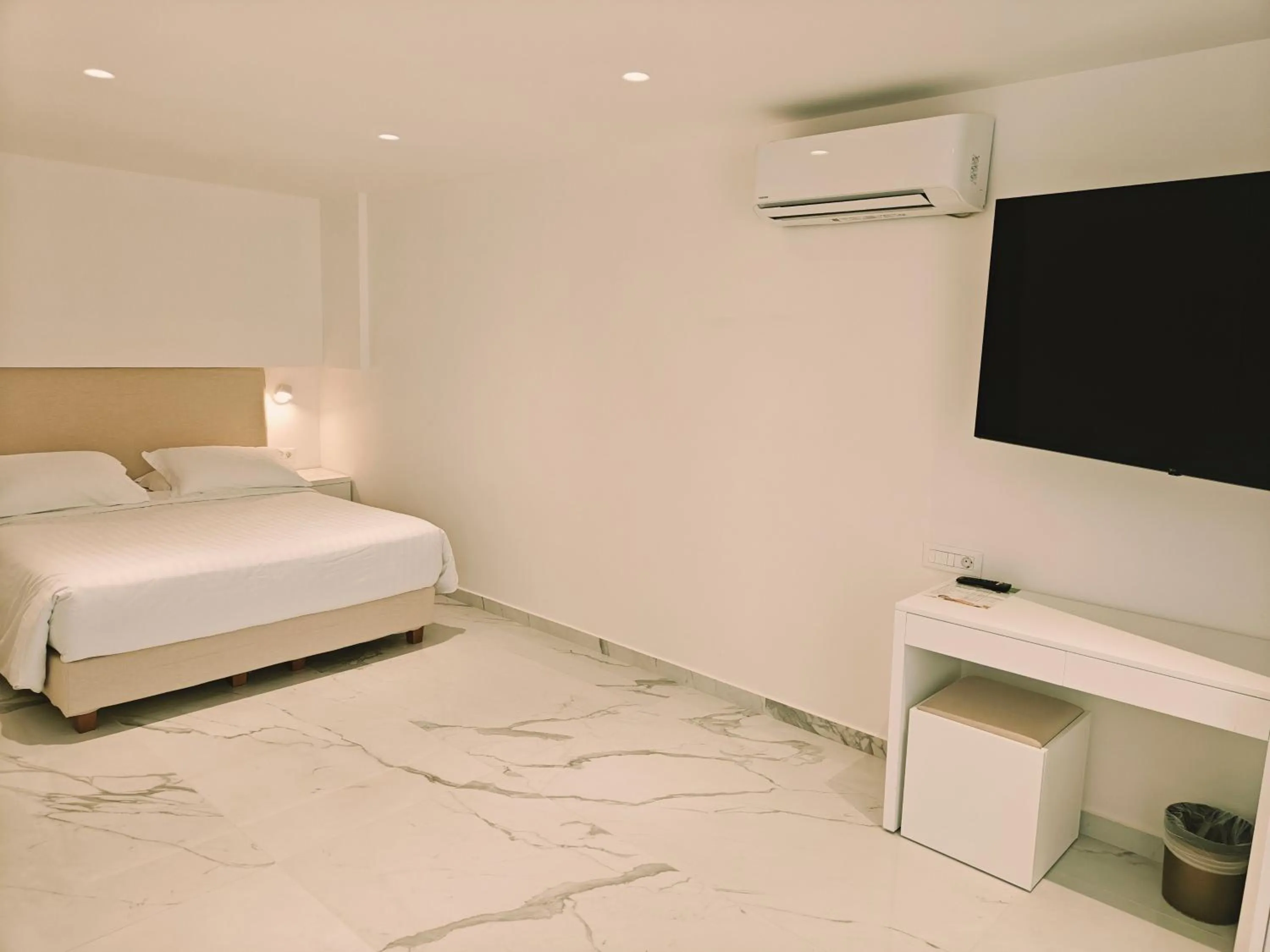 Bed in Ibiscus Hotel