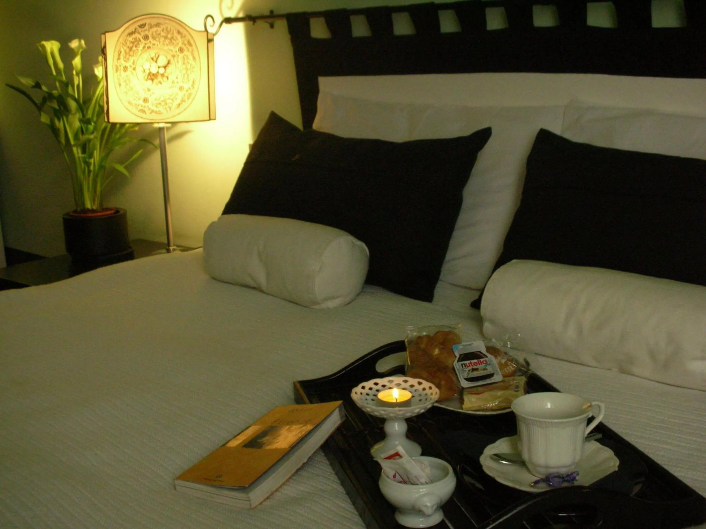 Decorative detail, Bed in Alberghino B&B