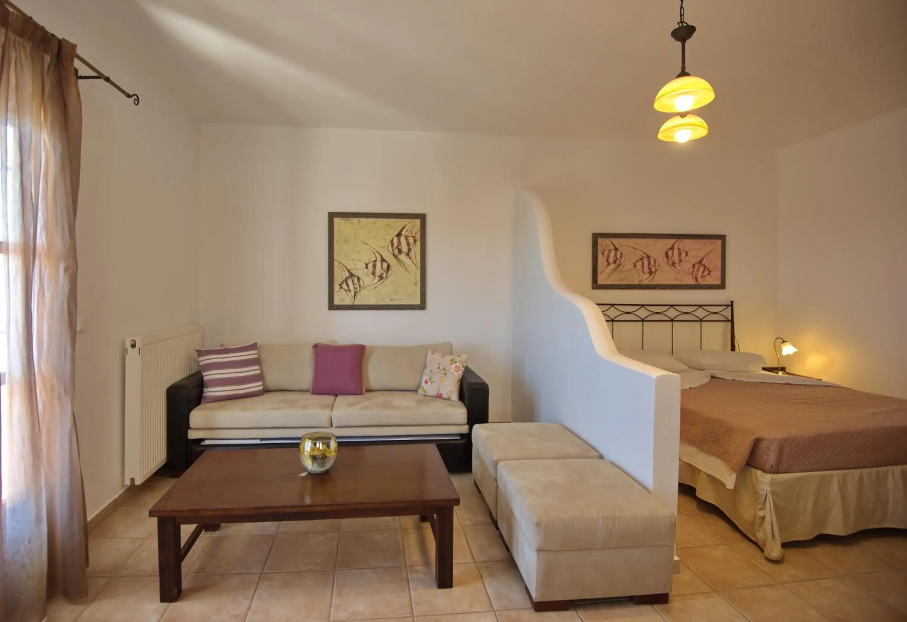 Seating area, Bed in Yalis Hotel