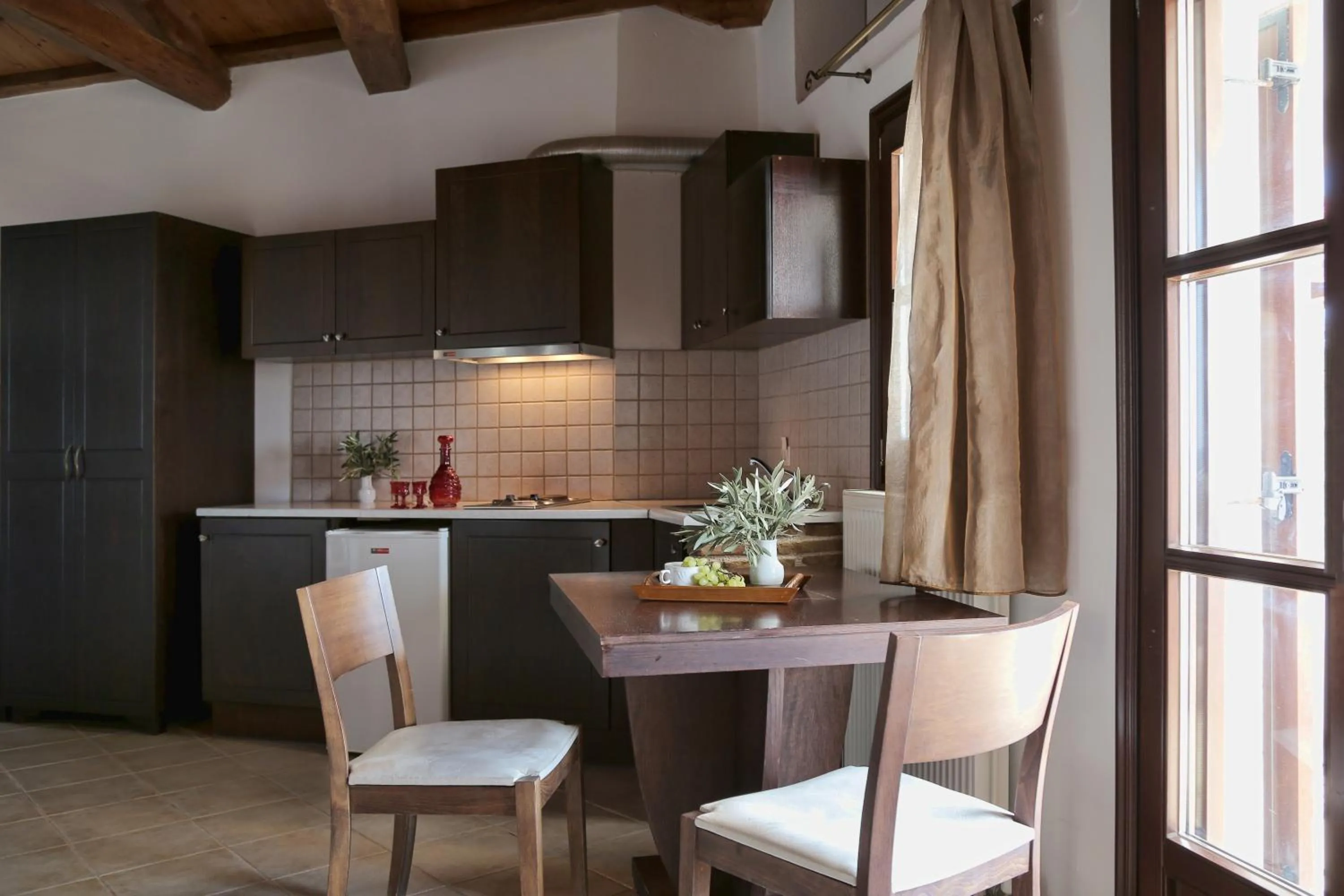 Kitchen or kitchenette in Yalis Hotel