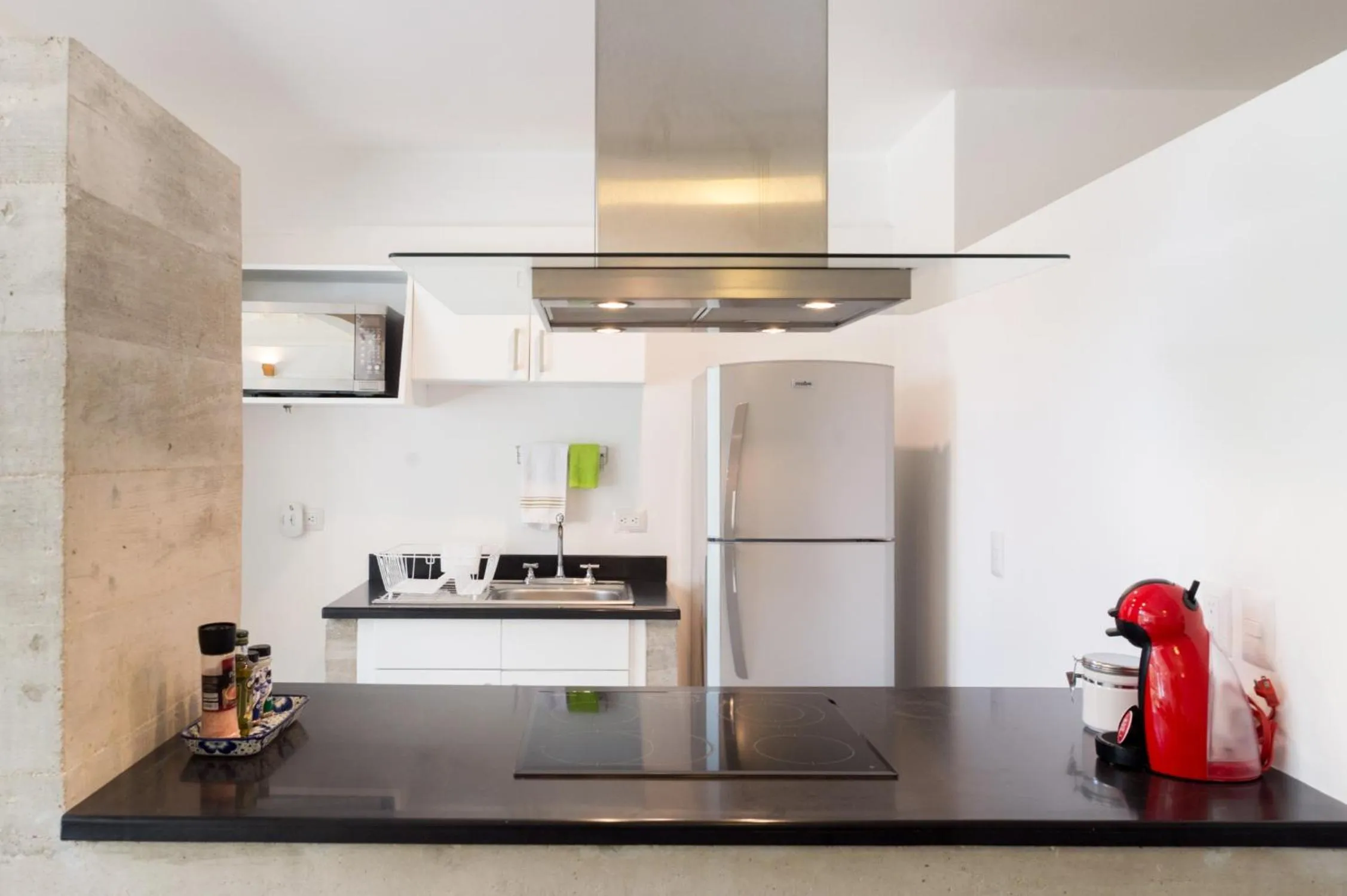 Kitchen or kitchenette in Casa de Piedra Tulum