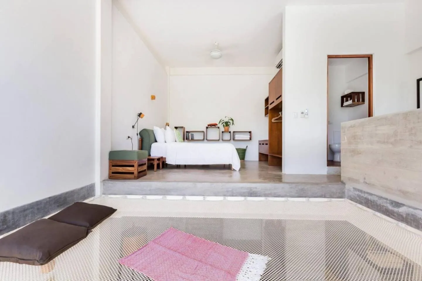 Bed in Casa de Piedra Tulum