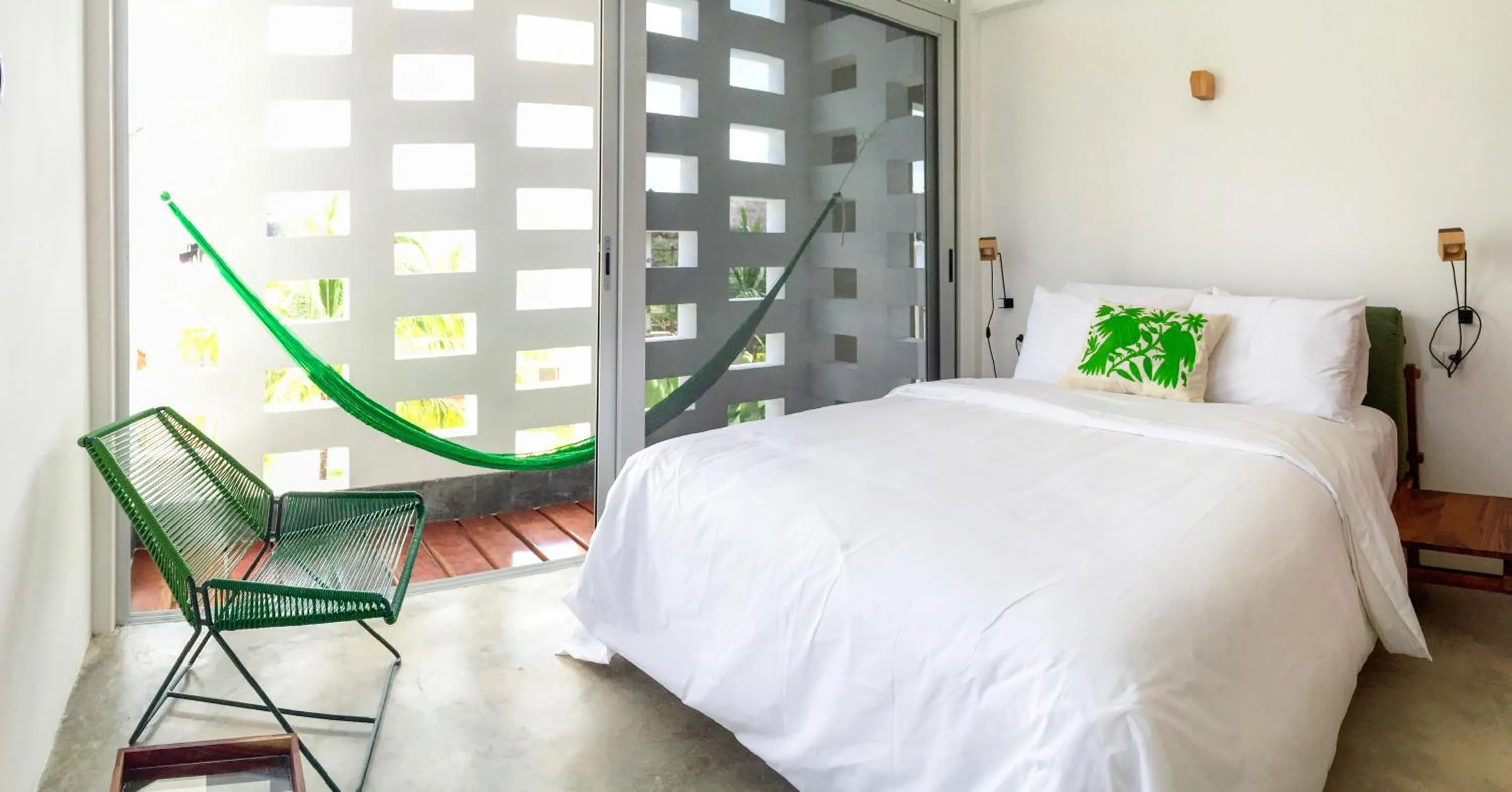 Bed in Casa de Piedra Tulum