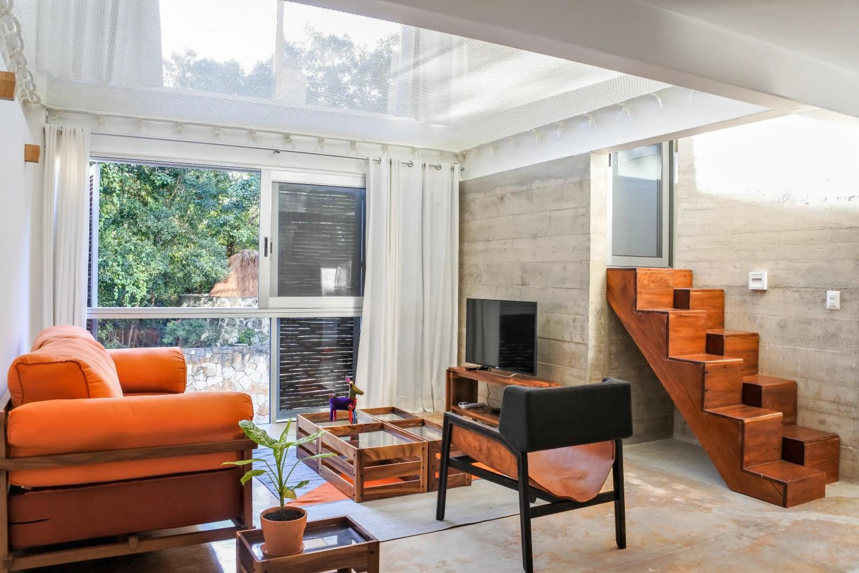 Living room in Casa de Piedra Tulum