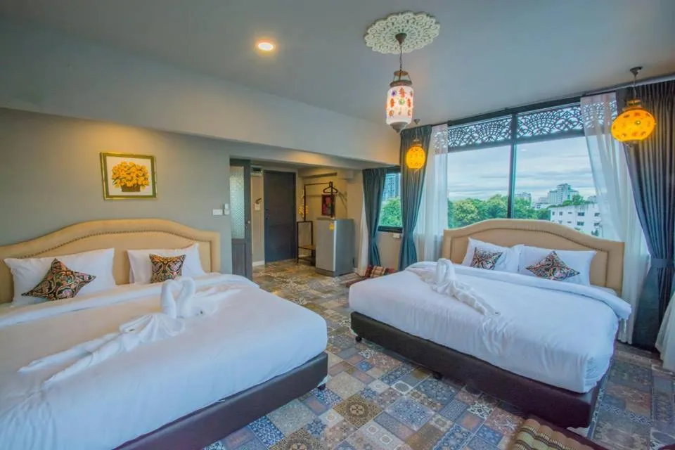 Photo of the whole room, Bed in Sridonchai Heritage, Night Bazaar Chiang Mai