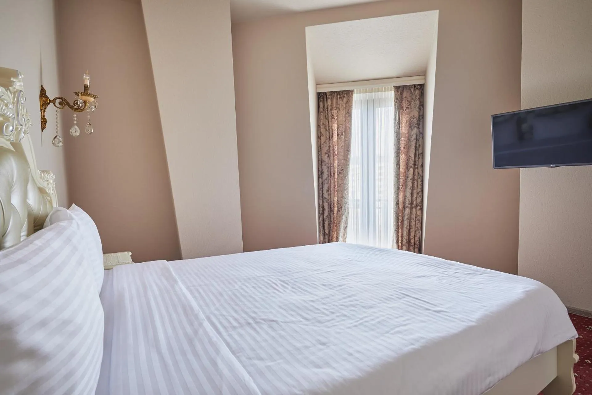 Bed in Hotel Pushkin