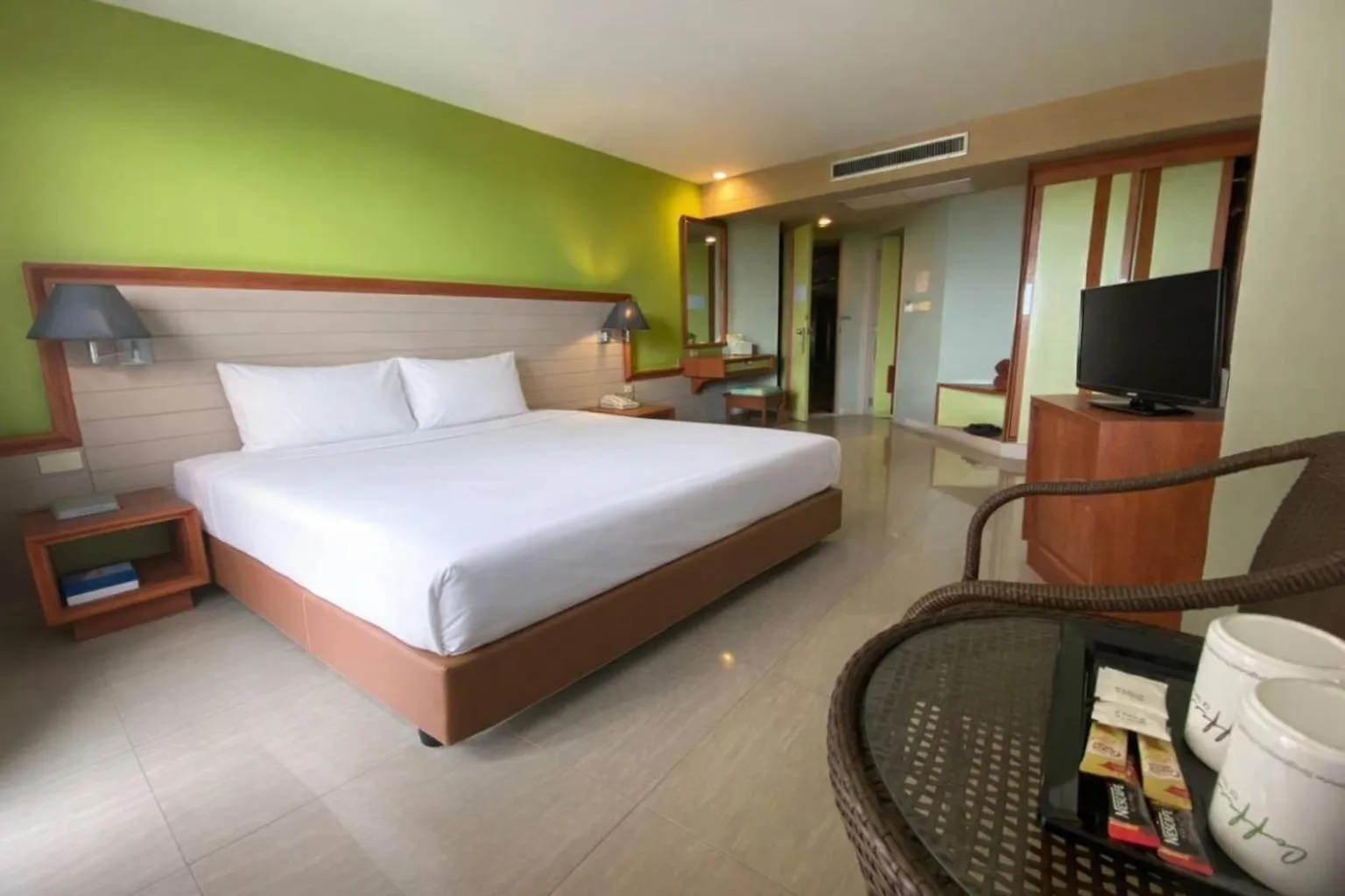 Bed in Long Beach Cha-Am Hotel