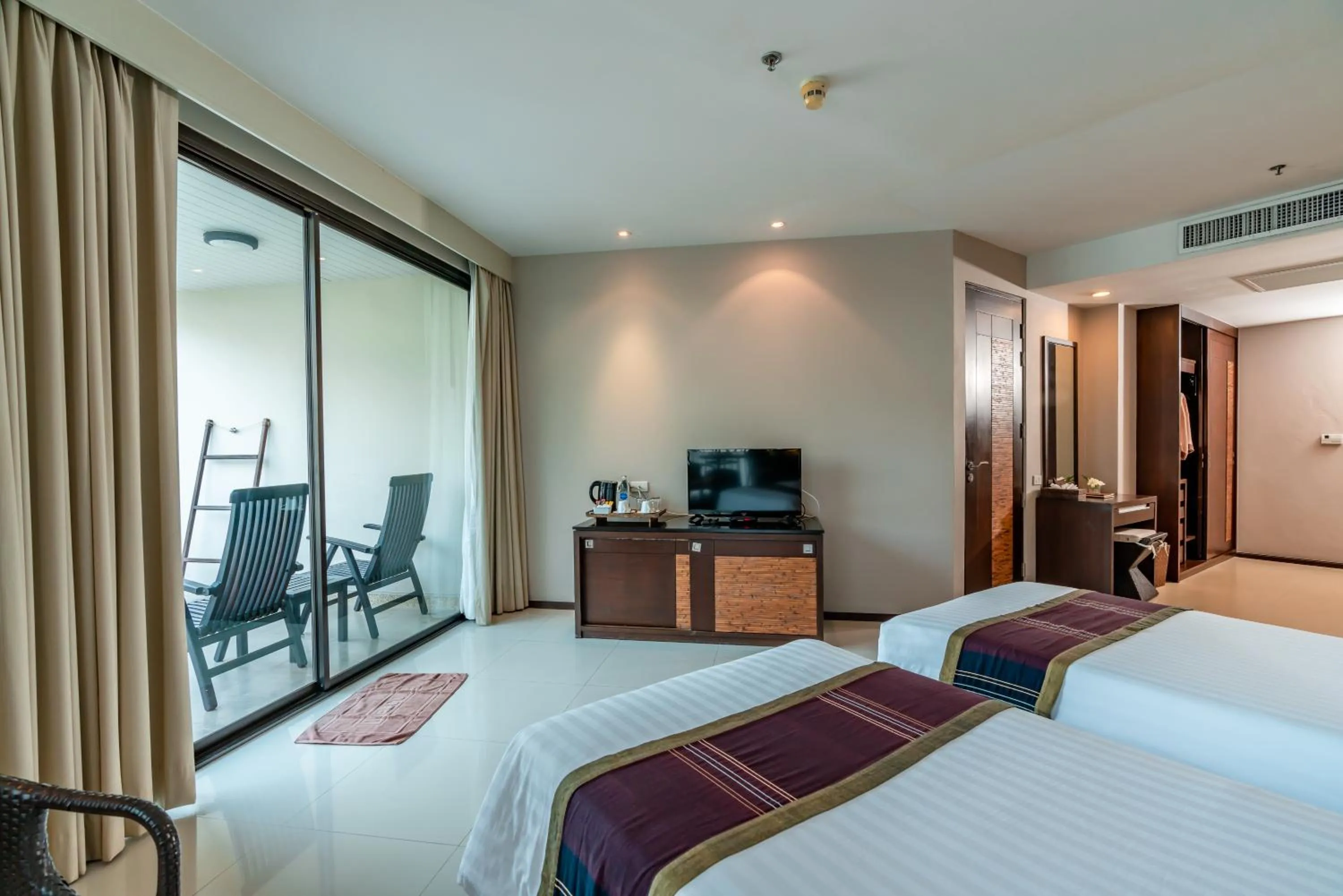 TV and multimedia, Bed in Tara Mantra Cha-Am Resort