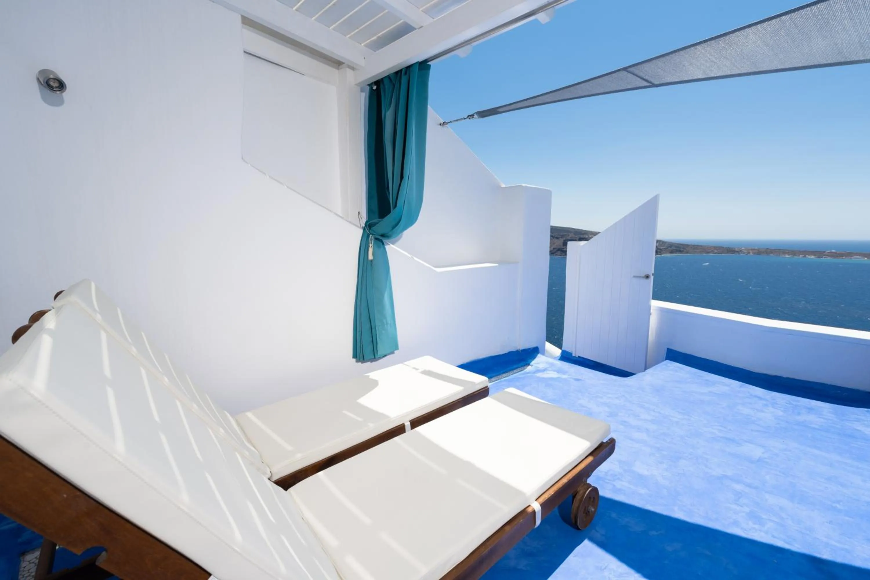 Balcony/Terrace, Bed in Hyperion Oia Suites