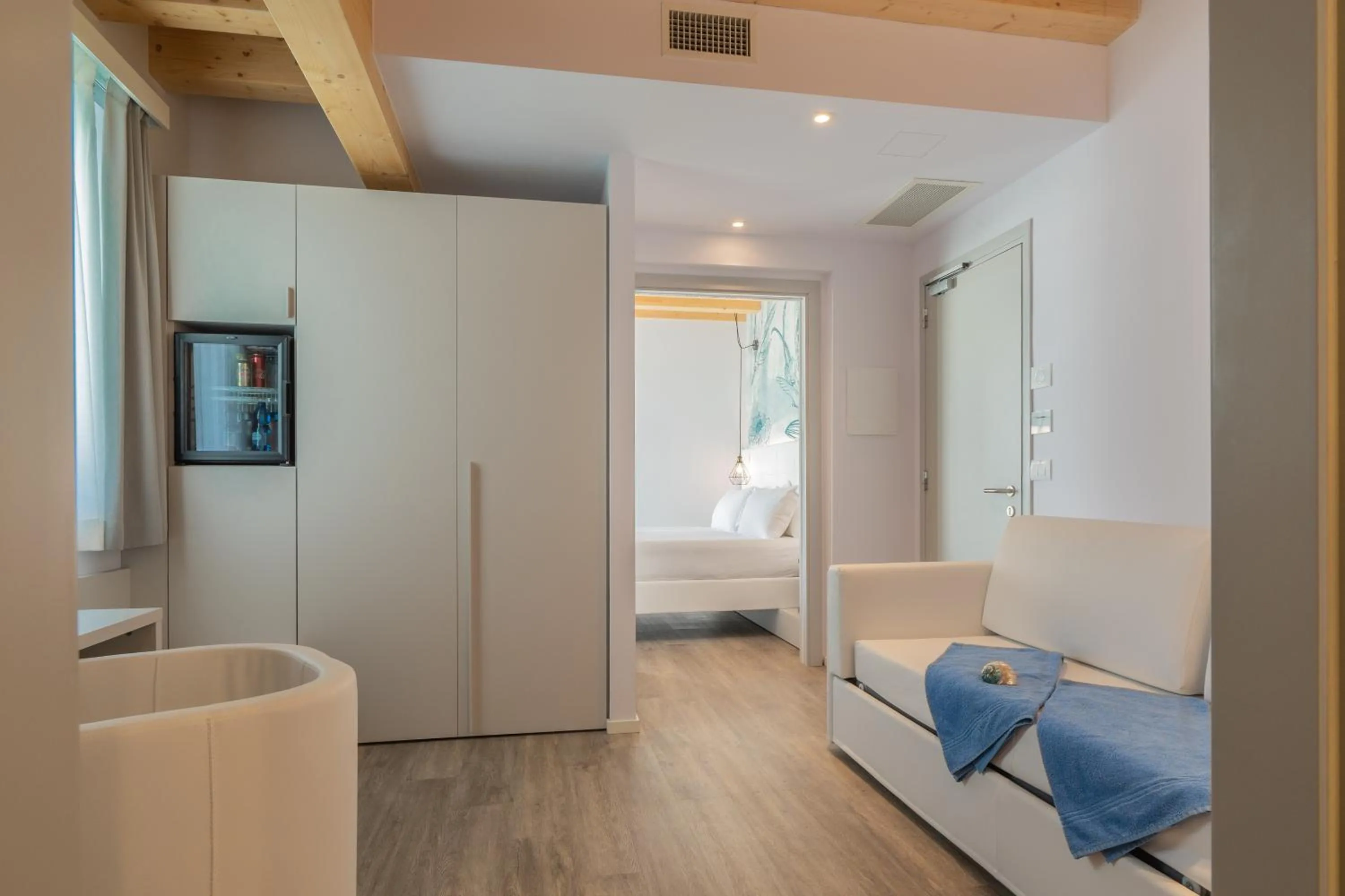 Living room, Bed in Hotel Elite