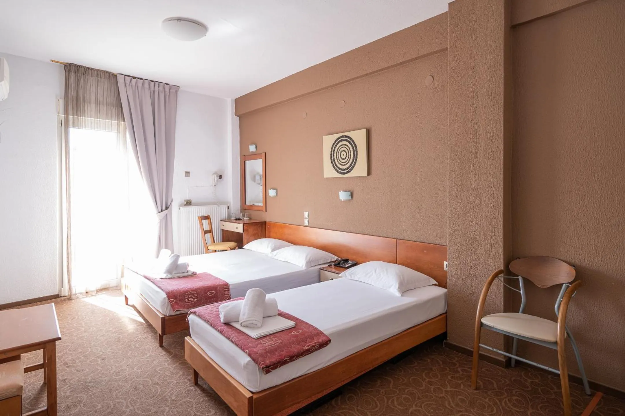 Bed in Hotel Akropol