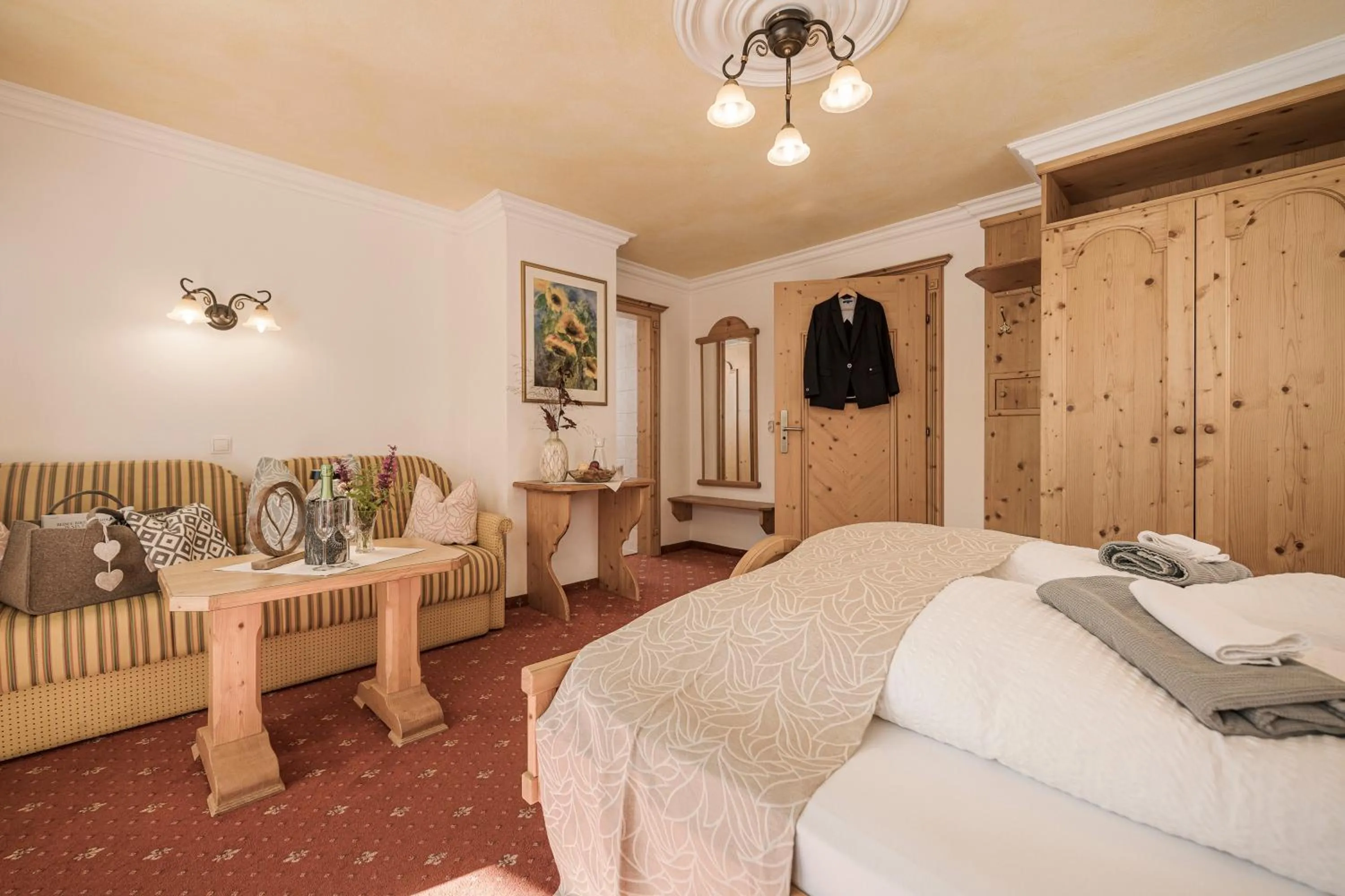 Photo of the whole room, Bed in Biohotel Rastbichlhof