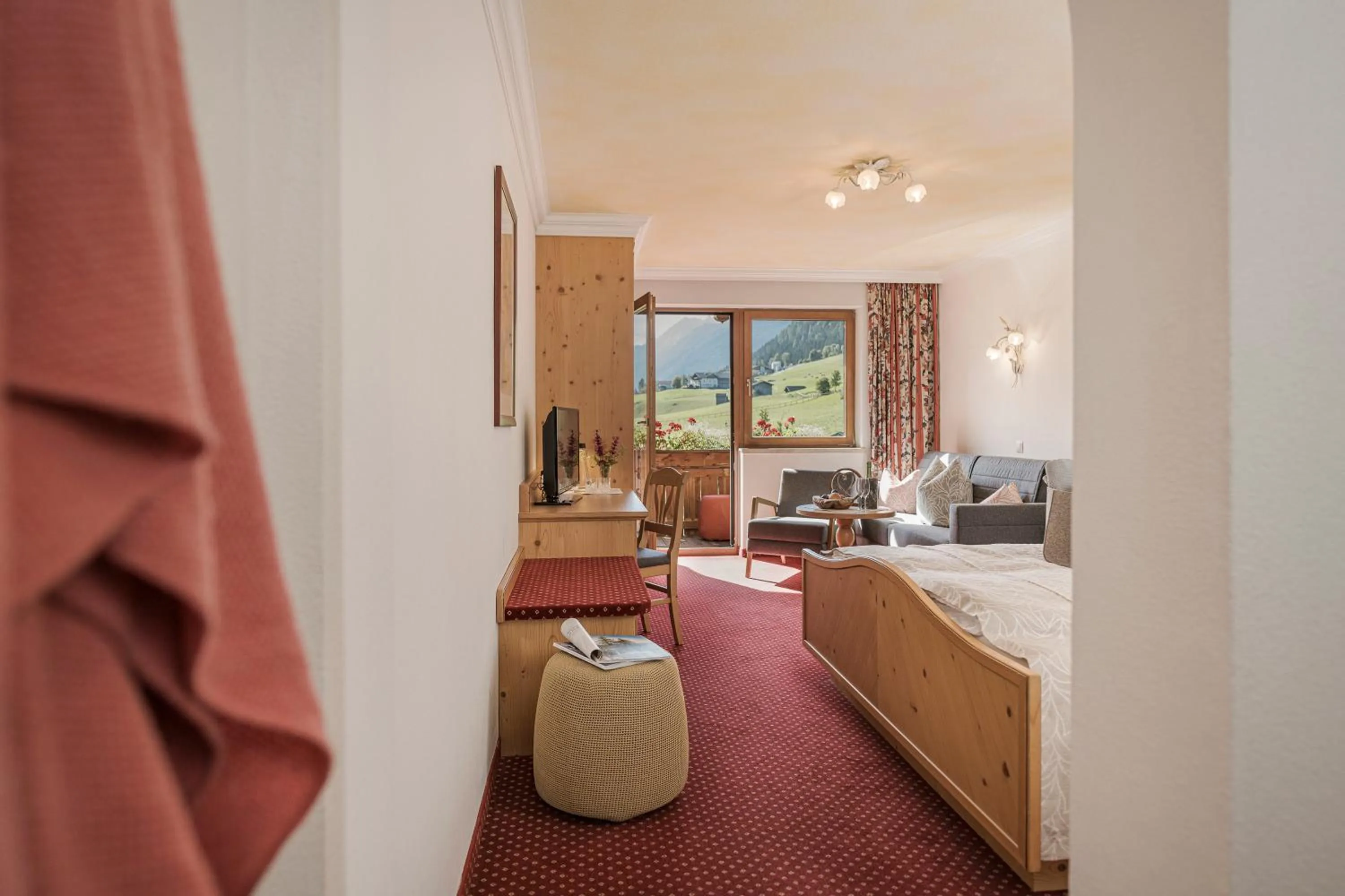 Photo of the whole room, Bed in Biohotel Rastbichlhof