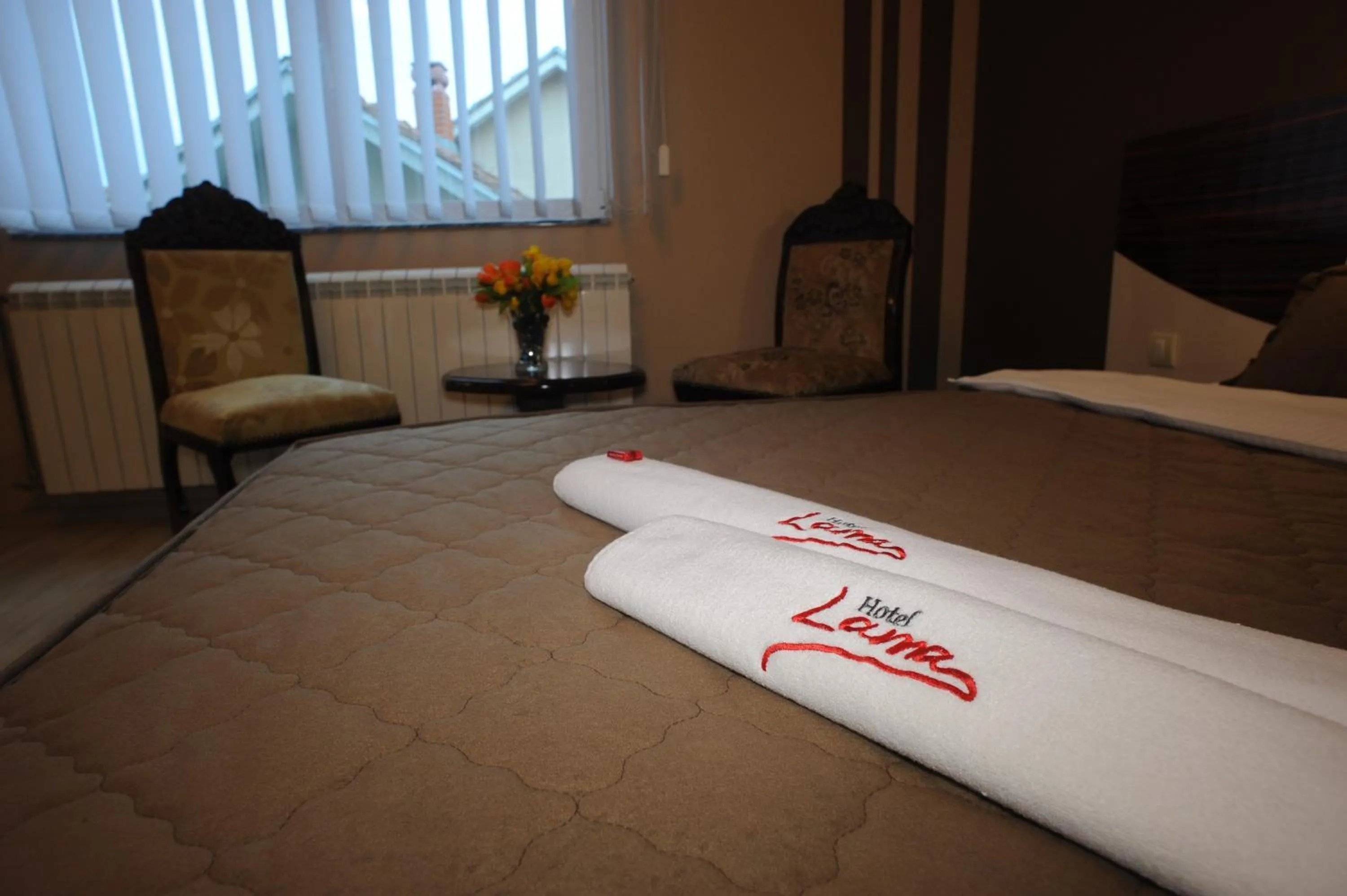 Seating area, Bed in Garni Hotel Lama