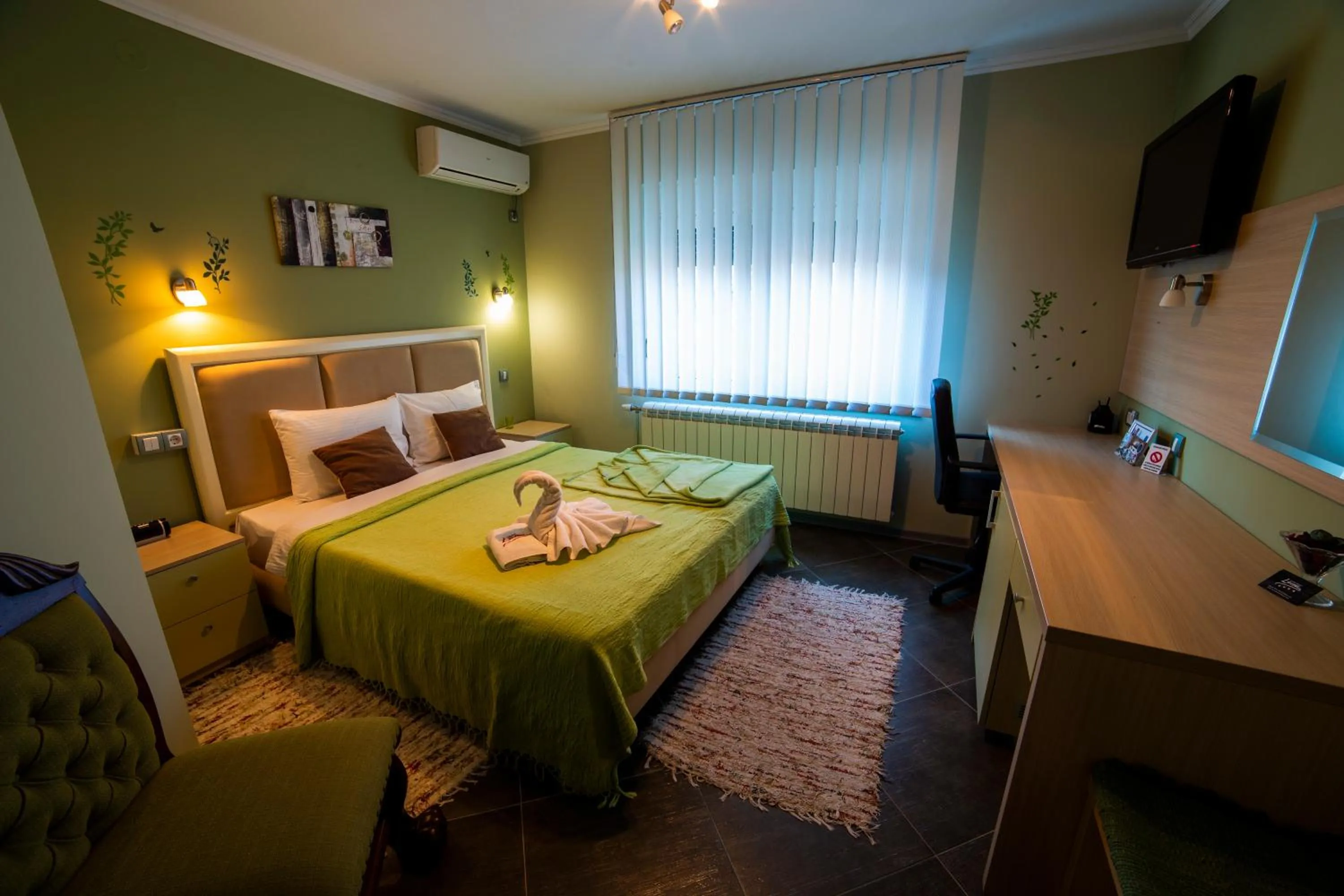 TV and multimedia, Bed in Garni Hotel Lama