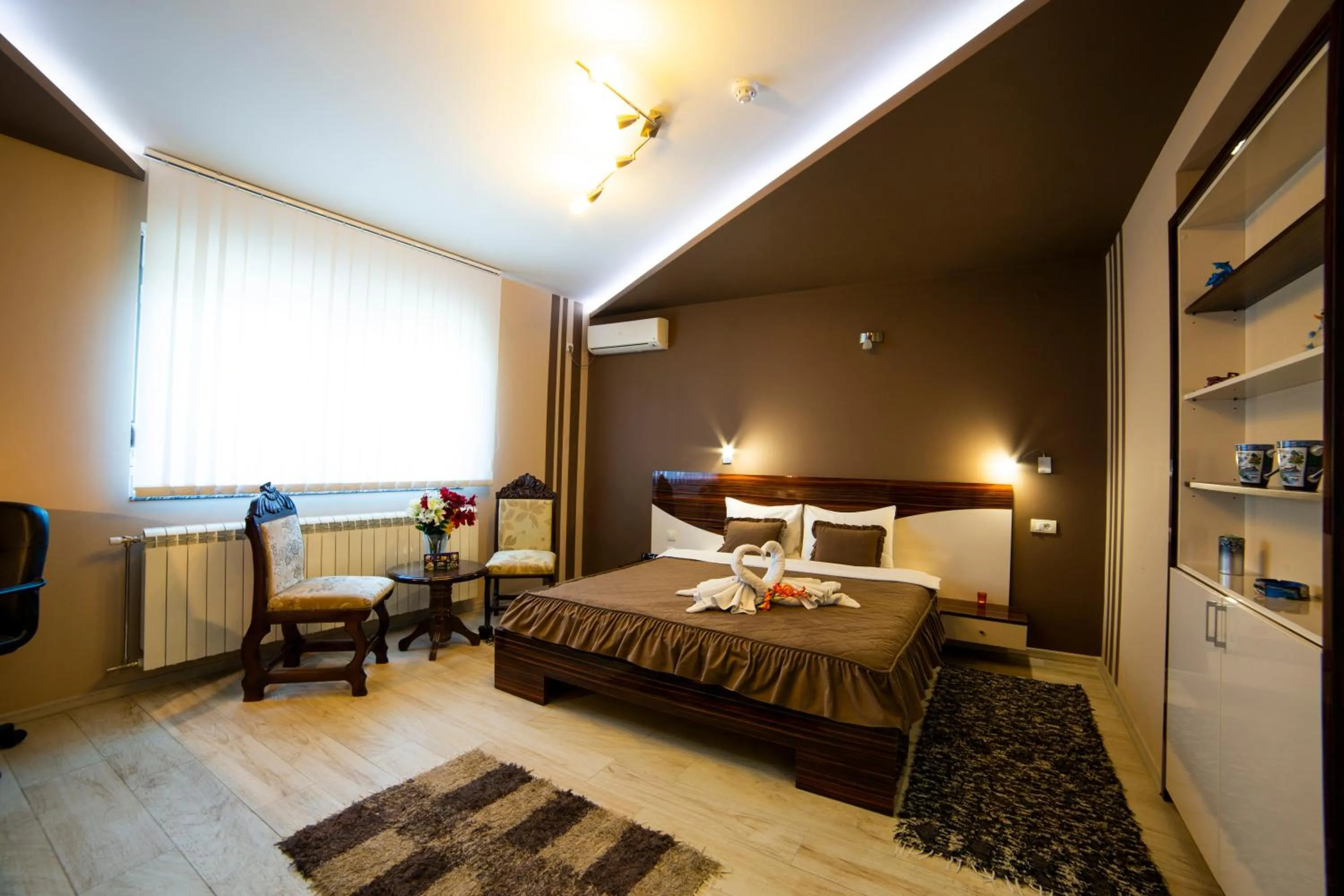 Bed in Garni Hotel Lama