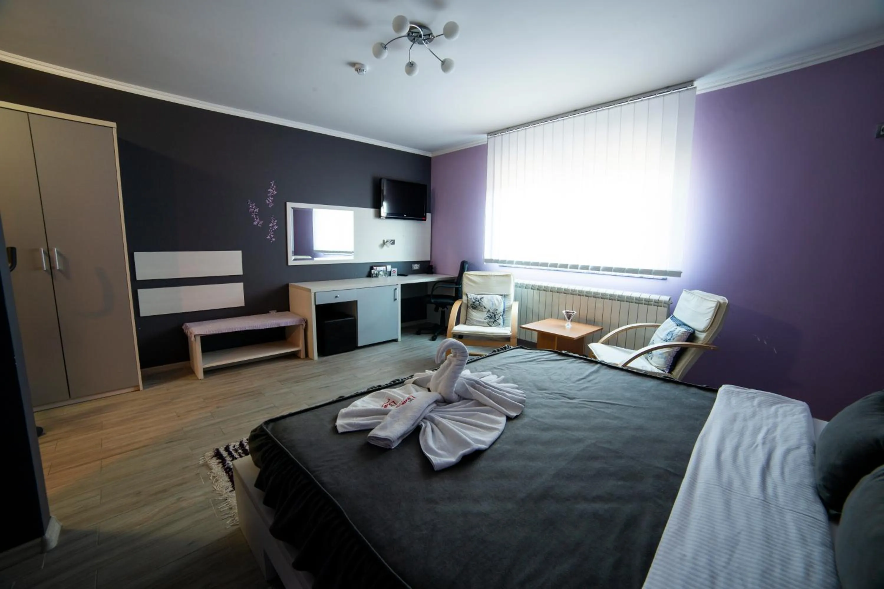 Bed in Garni Hotel Lama