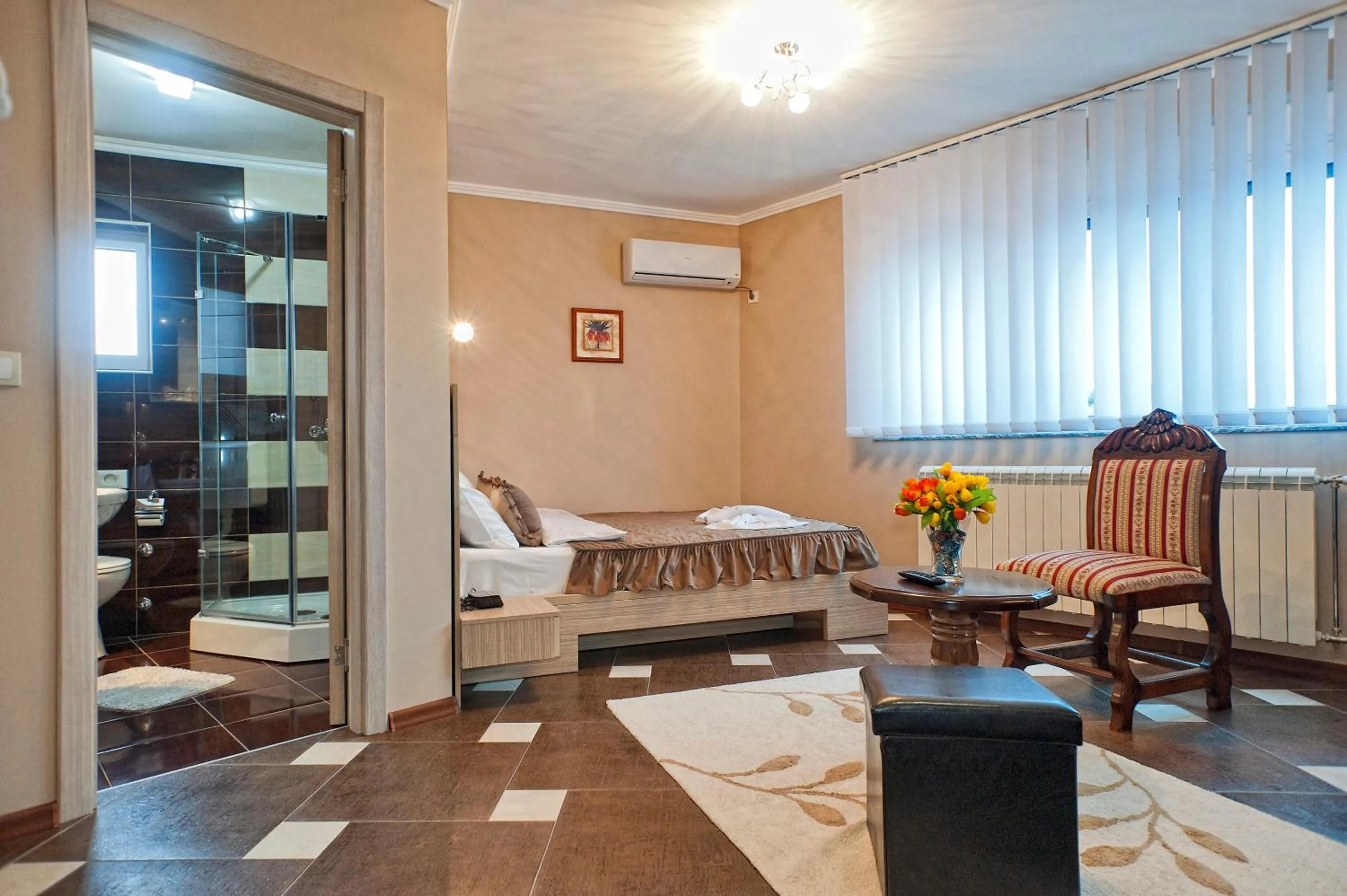 Bed in Garni Hotel Lama