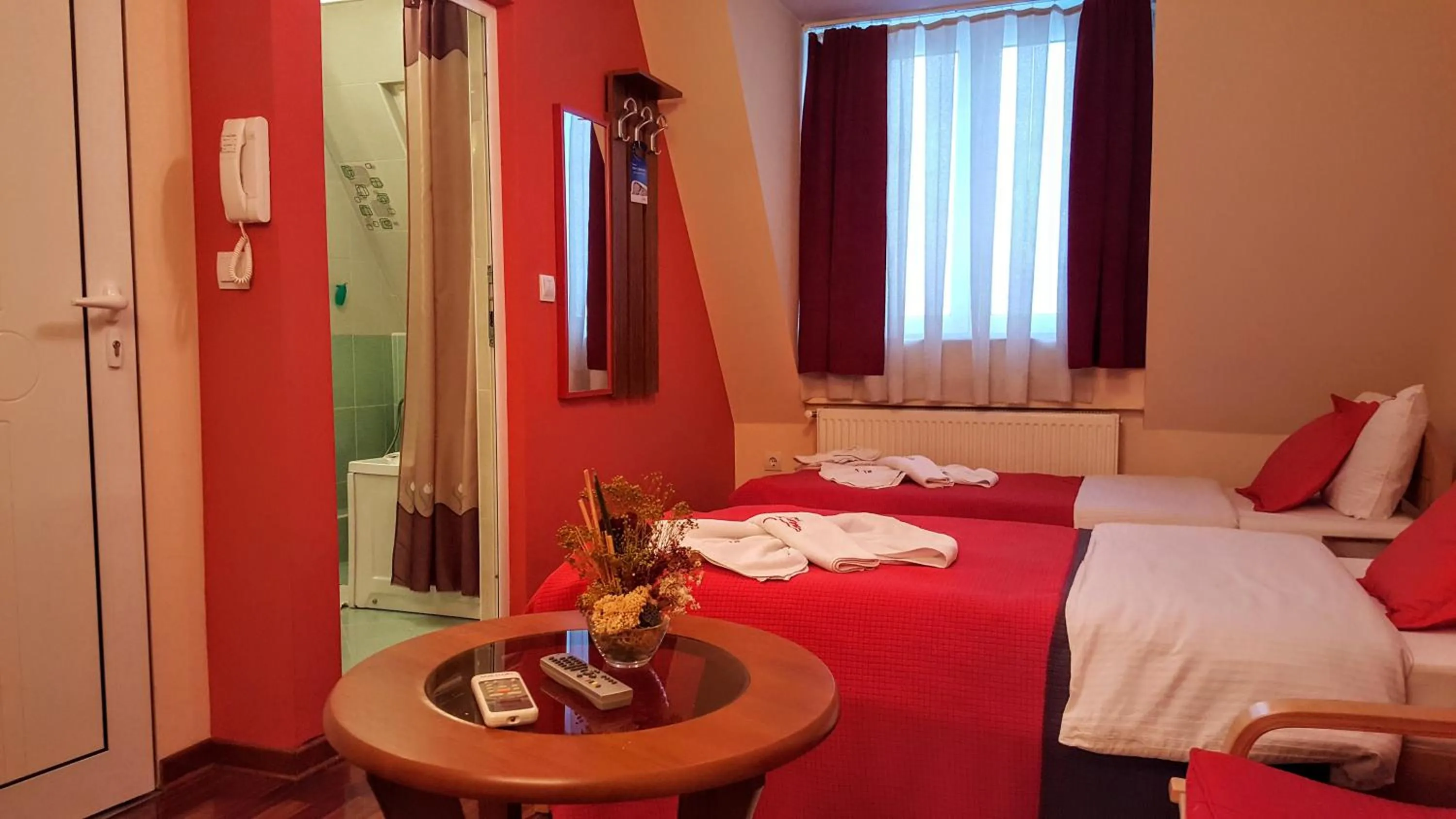 Bed in Garni Hotel Lama