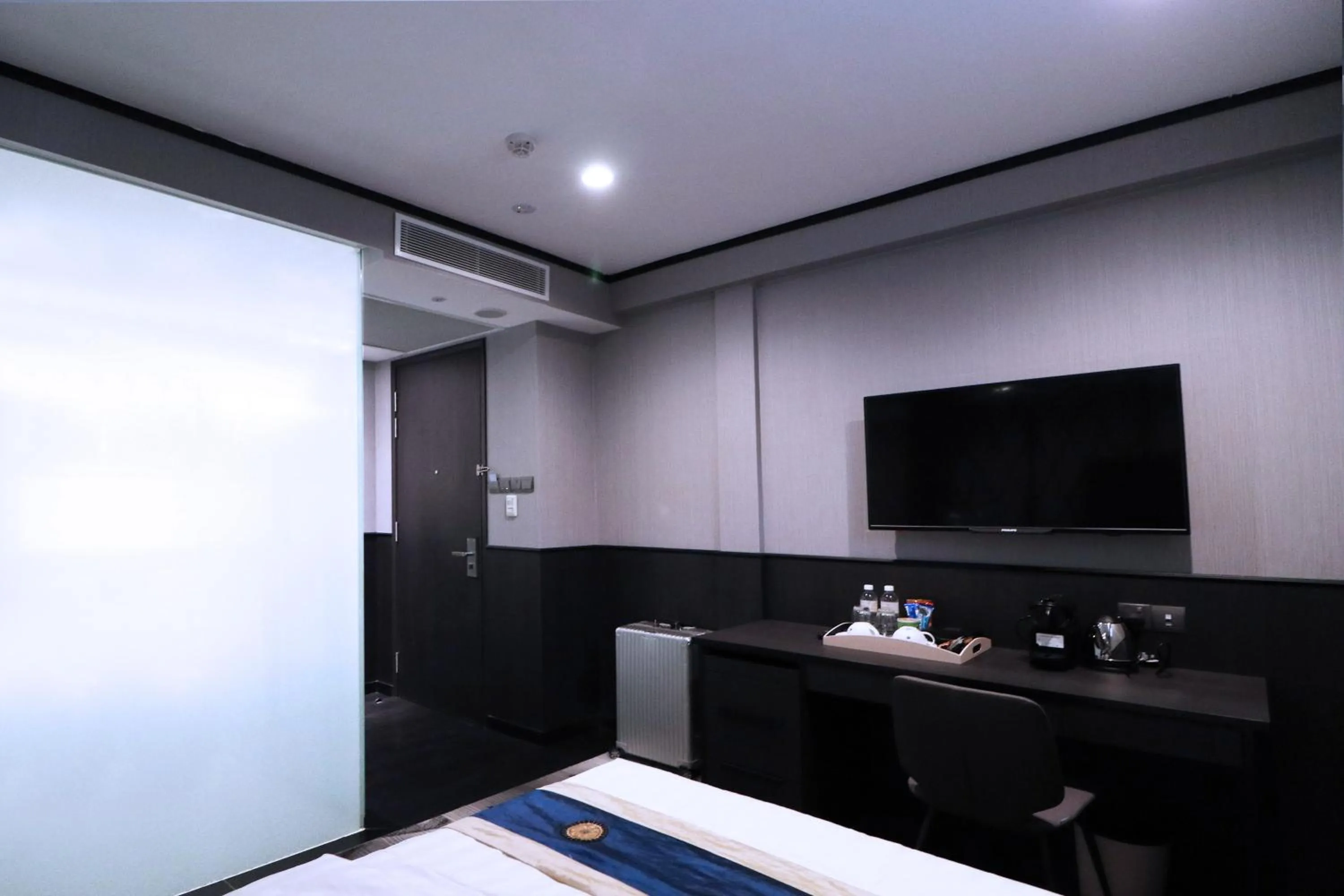 Photo of the whole room, Bed in Hotel NuVe Urbane