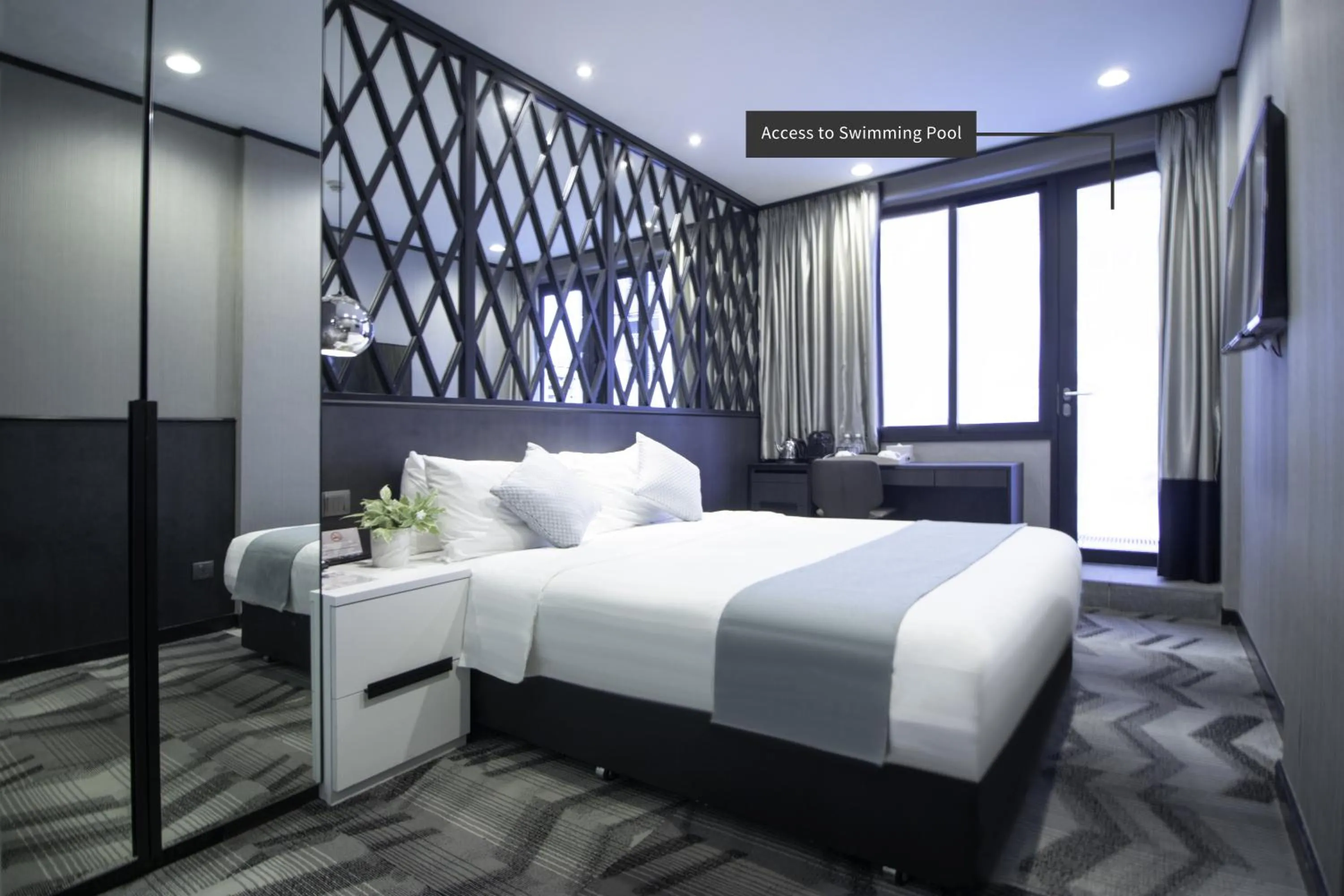 Bed in Hotel NuVe Urbane