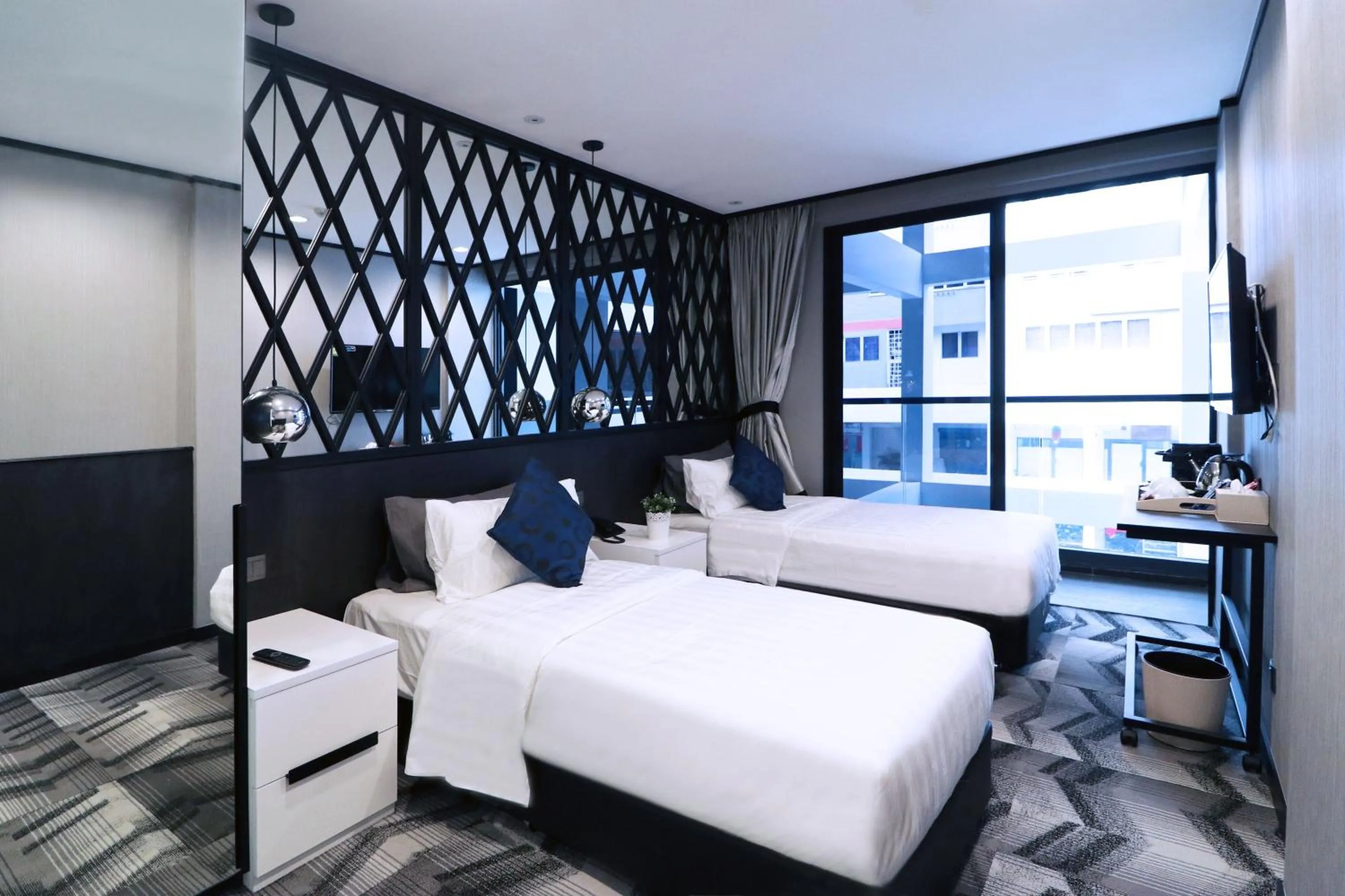 Photo of the whole room, Bed in Hotel NuVe Urbane