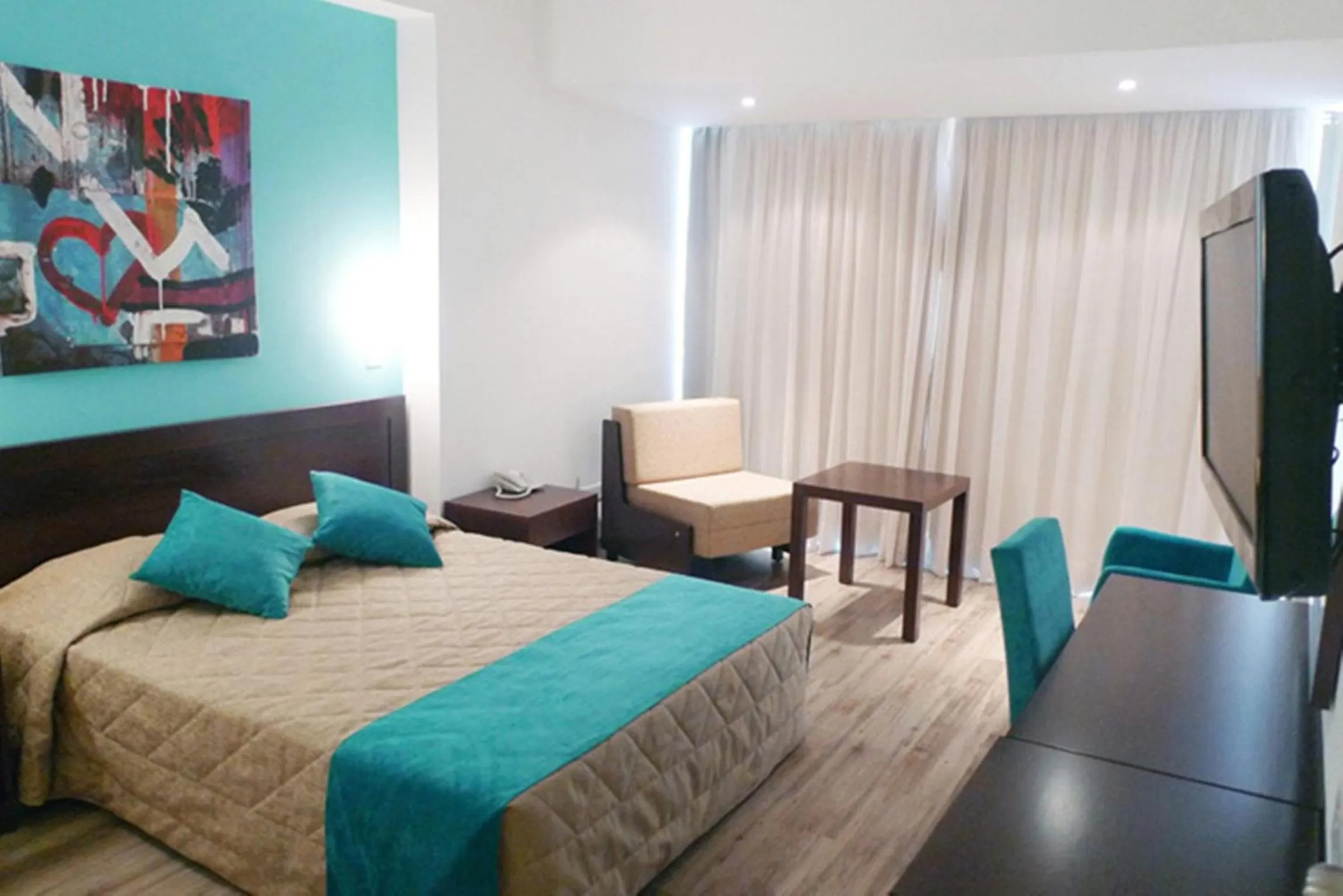 Bed in Crystal Springs Beach Hotel