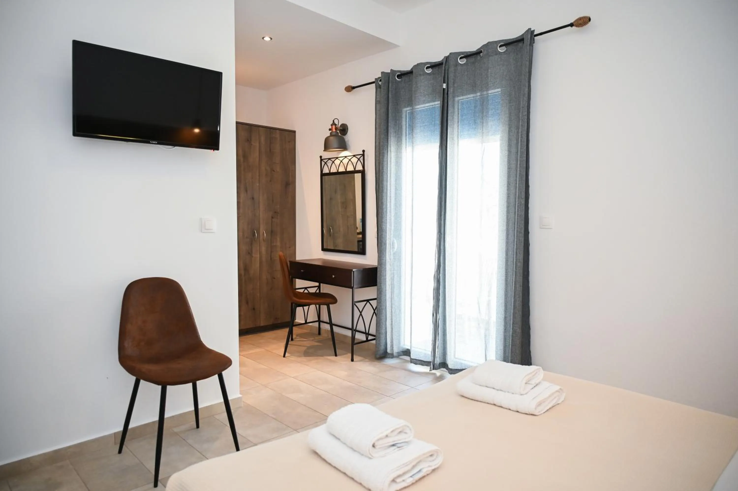 Bed in Glaronisia Hotel