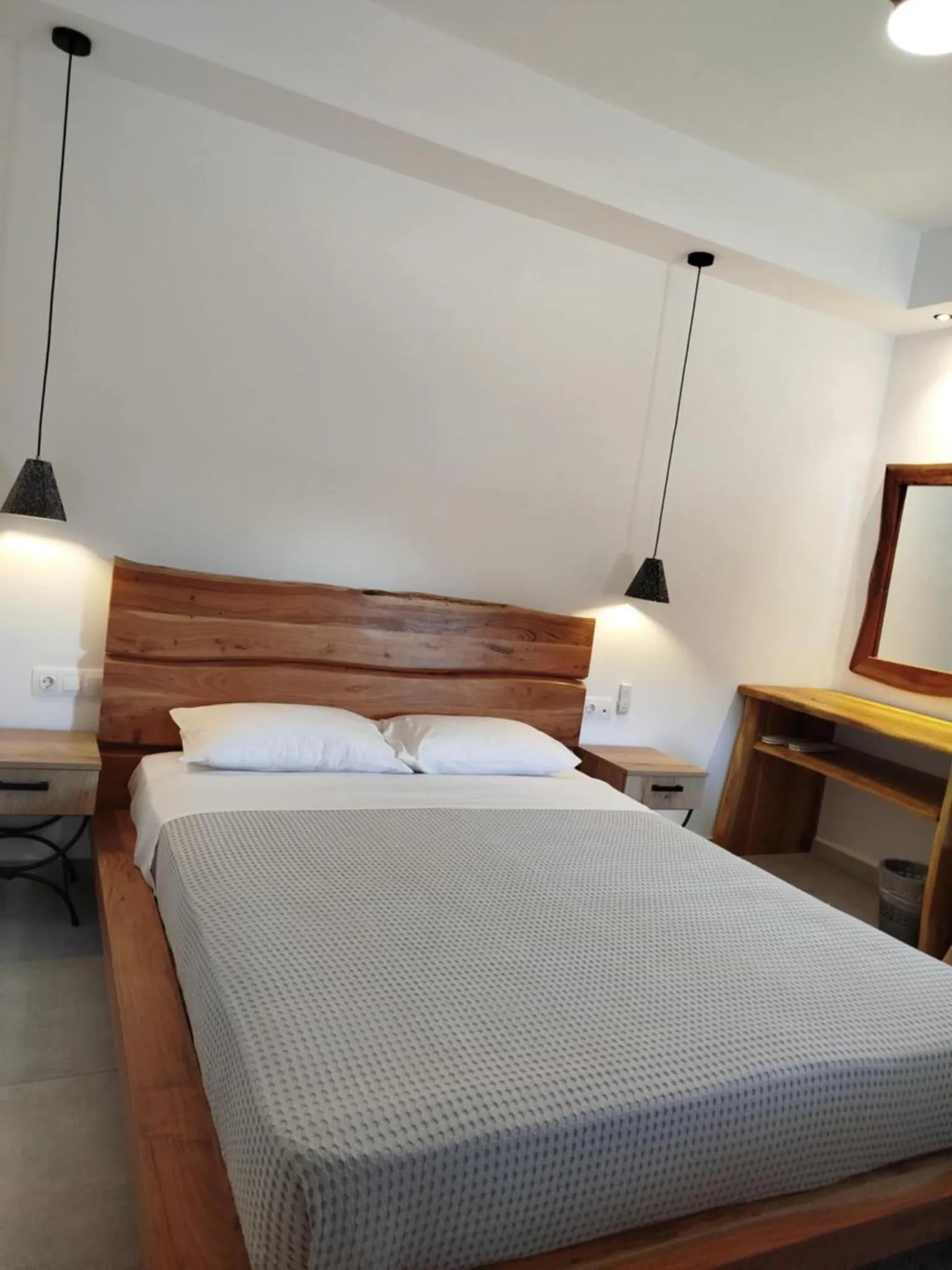 Bed in Glaronisia Hotel