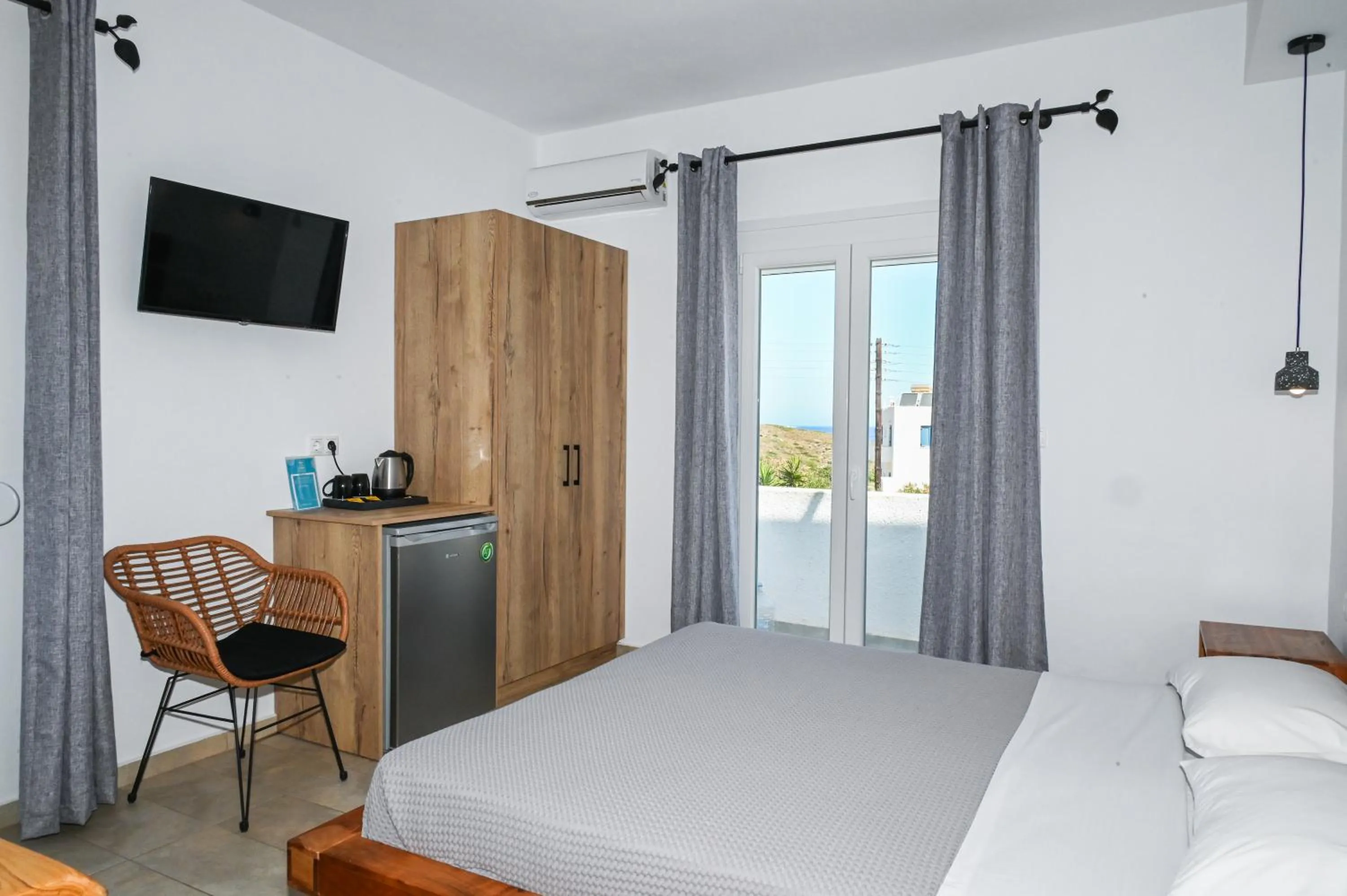 Bed in Glaronisia Hotel