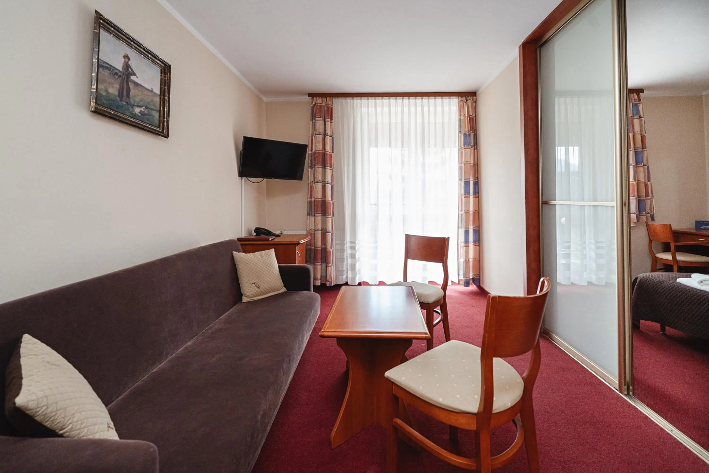 Communal lounge/ TV room in Kompleks Antałówka Termy & Med