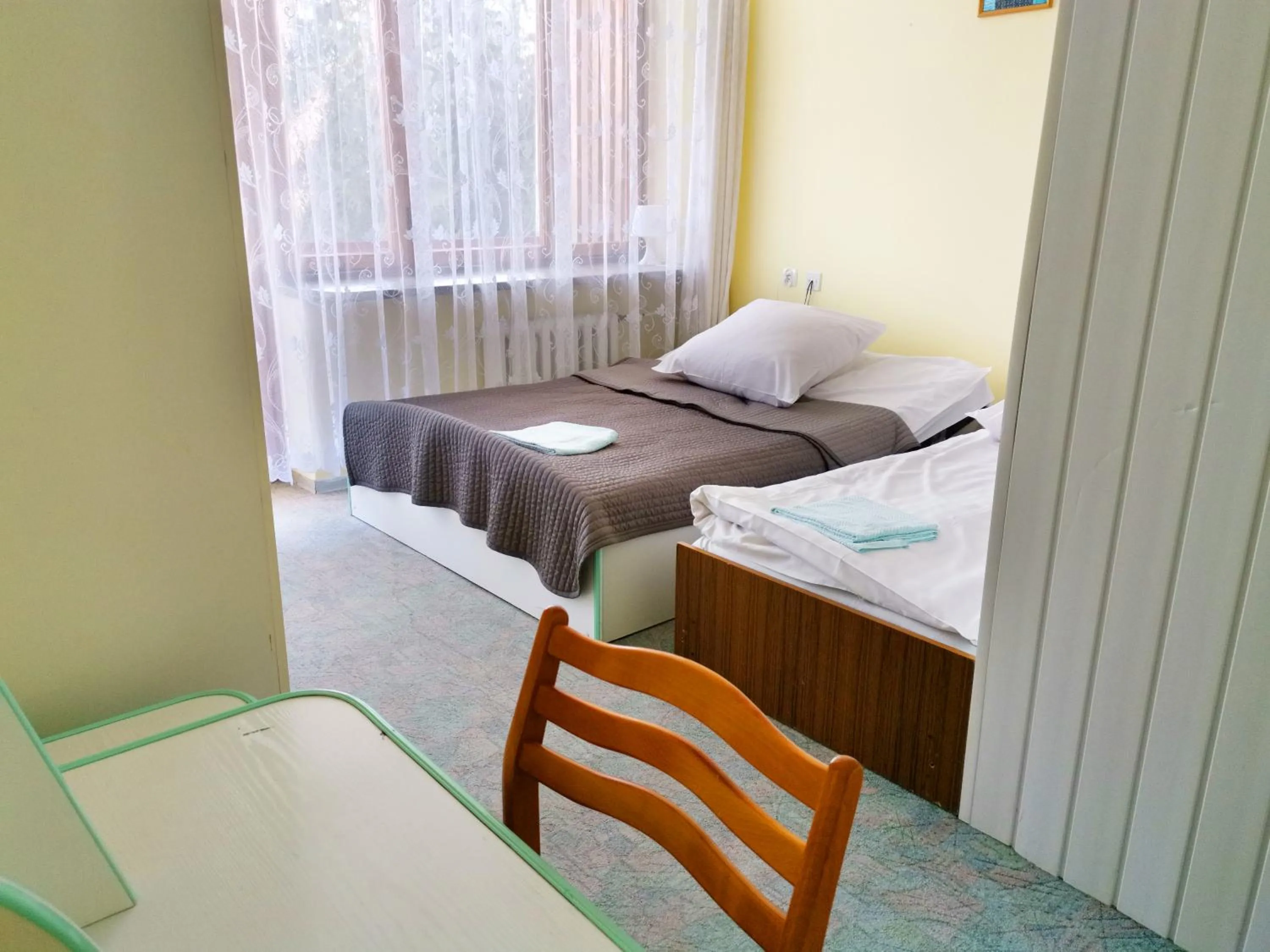 Bed in Zespół Tatry - Hotel Tatry i Budynek Turystyczny