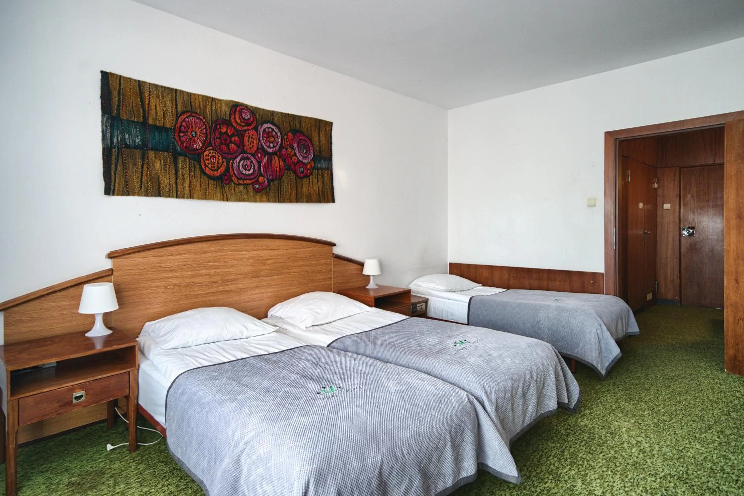 Bed in Zespół Tatry - Hotel Tatry i Budynek Turystyczny