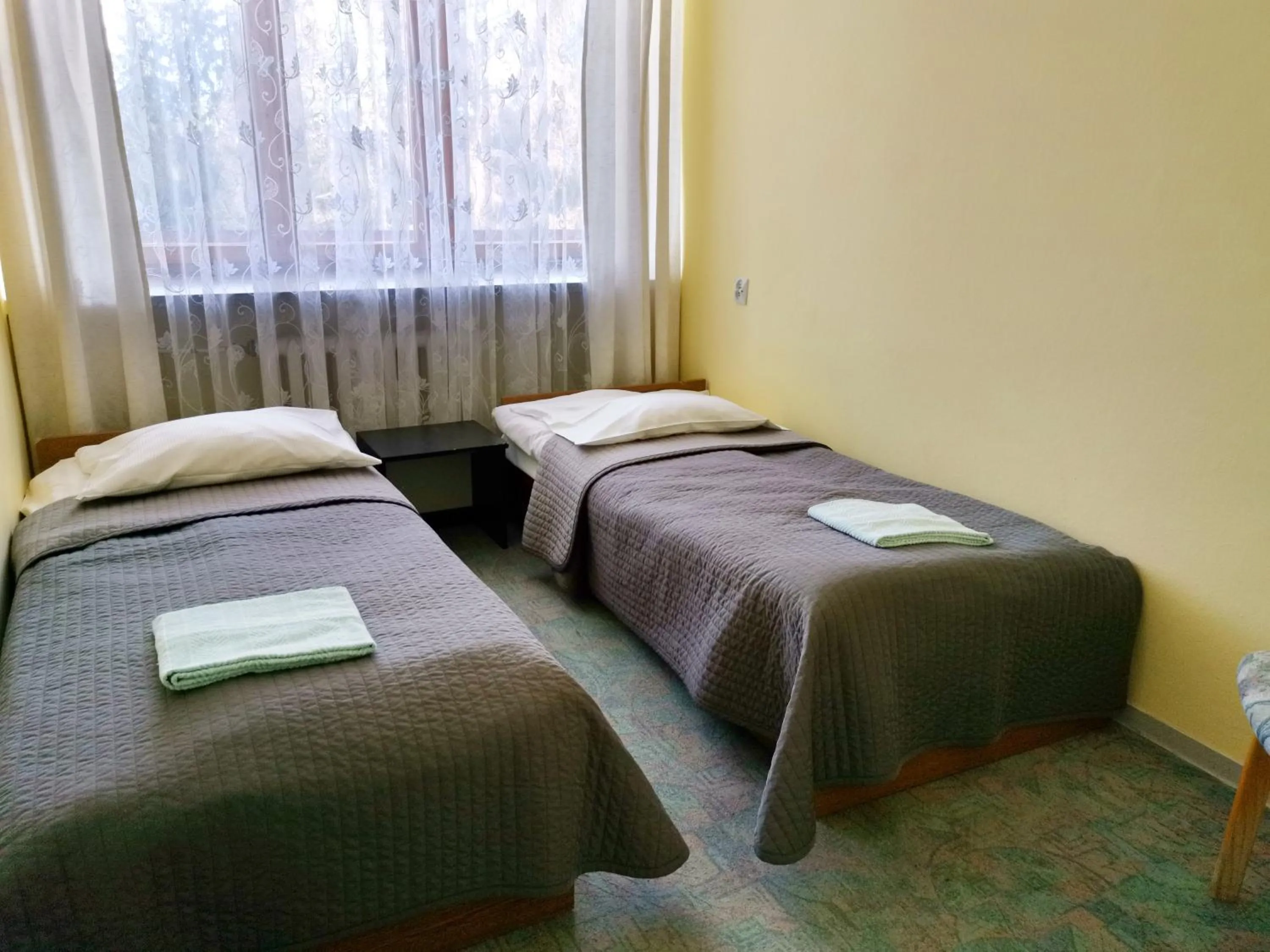 Bed in Zespół Tatry - Hotel Tatry i Budynek Turystyczny