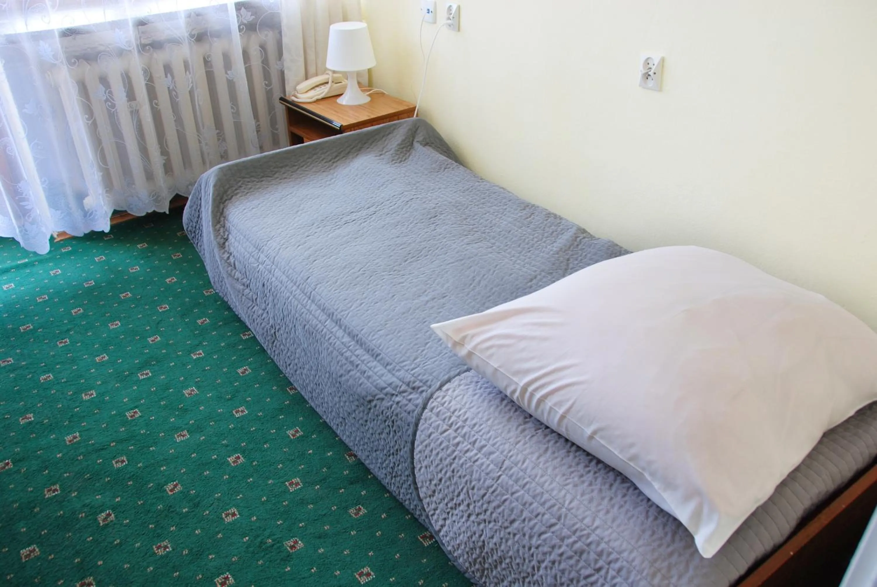 Bed in Zespół Tatry - Hotel Tatry i Budynek Turystyczny