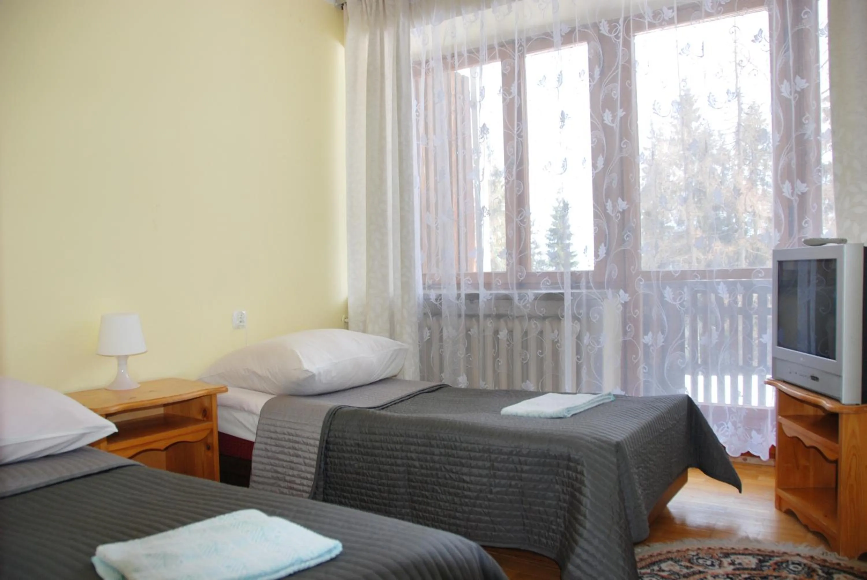 Bed in Zespół Tatry - Hotel Tatry i Budynek Turystyczny