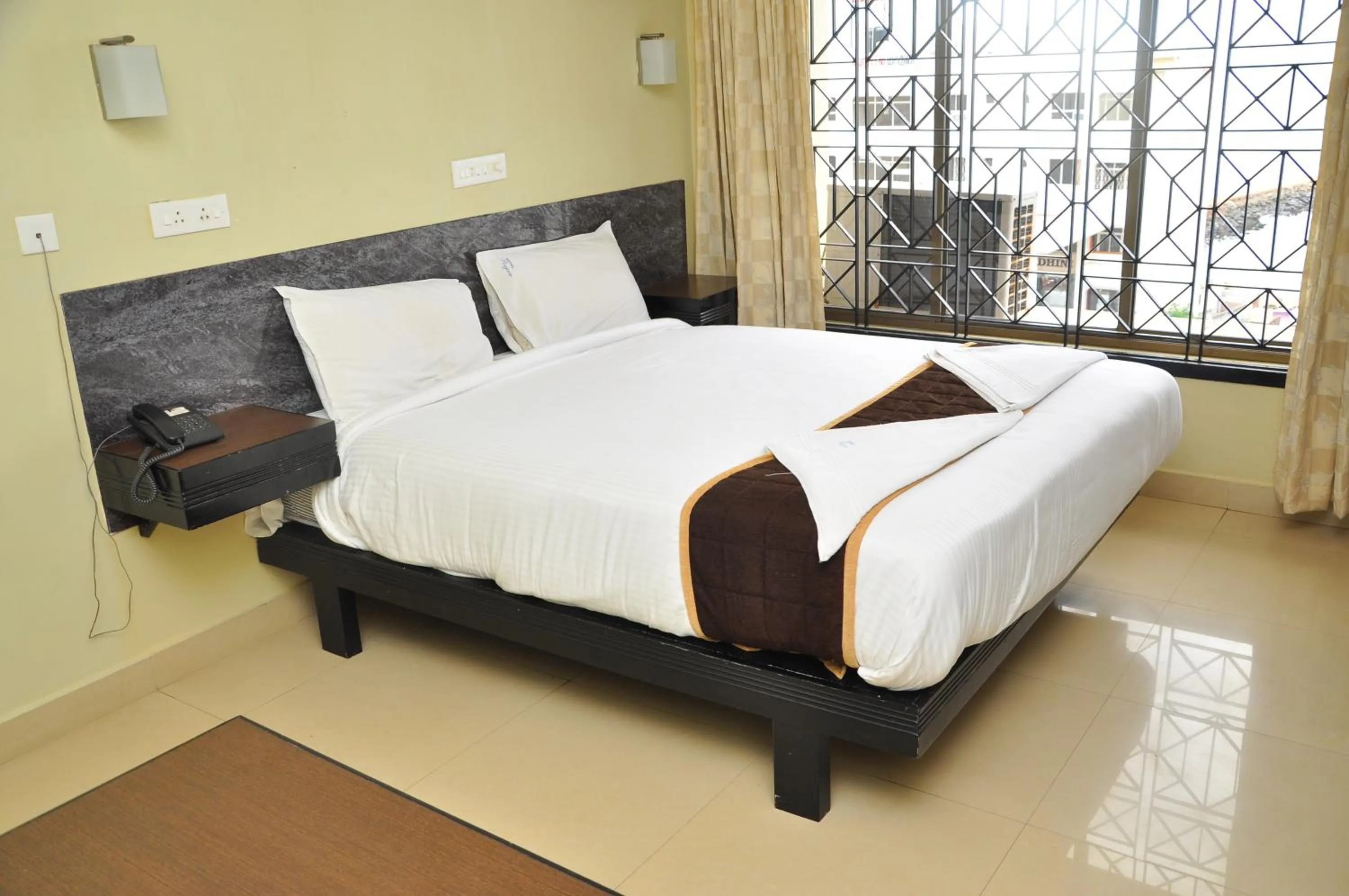 Bed in Hotel Rajam