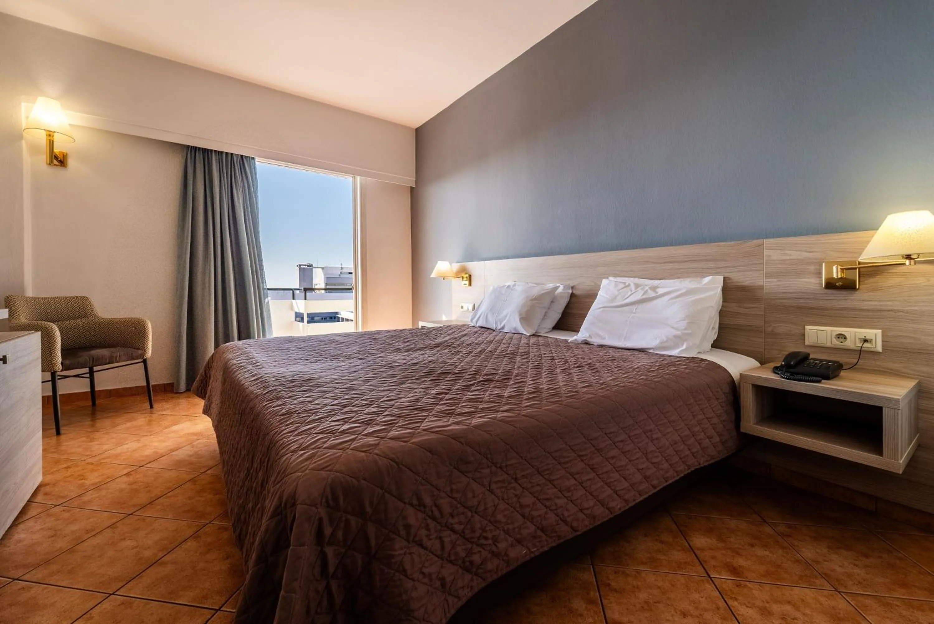 Bed in Oceanis Hotel