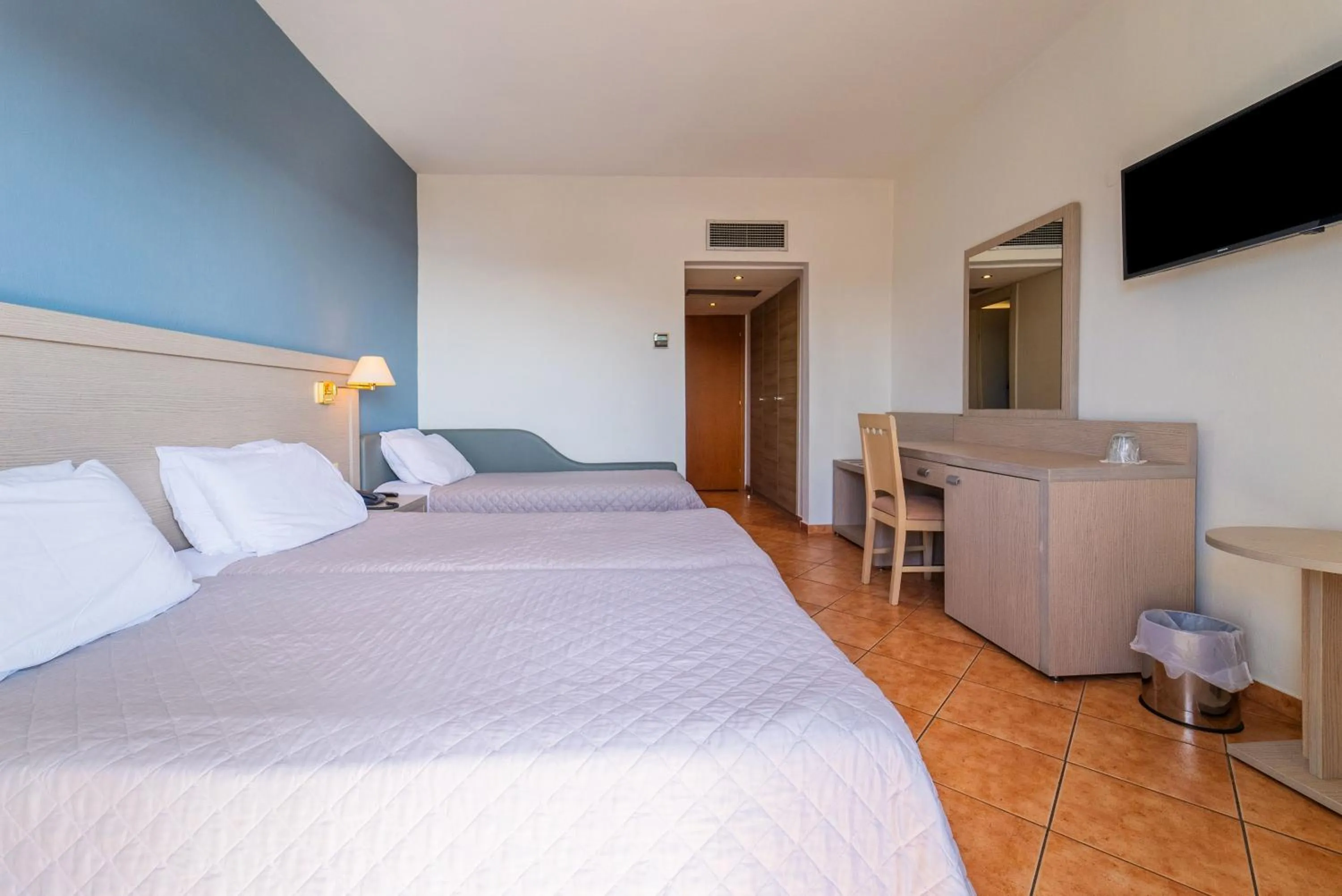 Bed in Oceanis Hotel