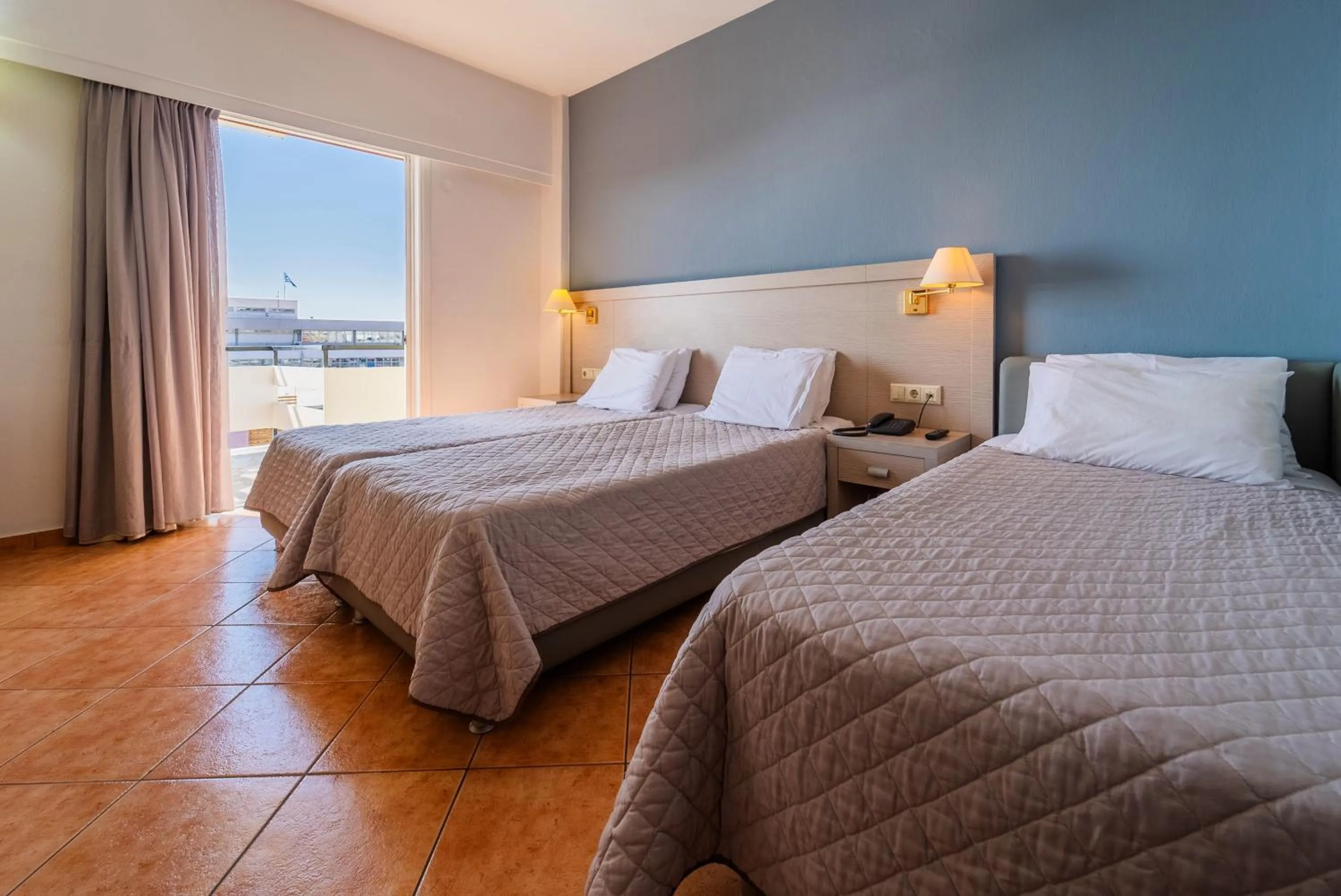 Bed in Oceanis Hotel