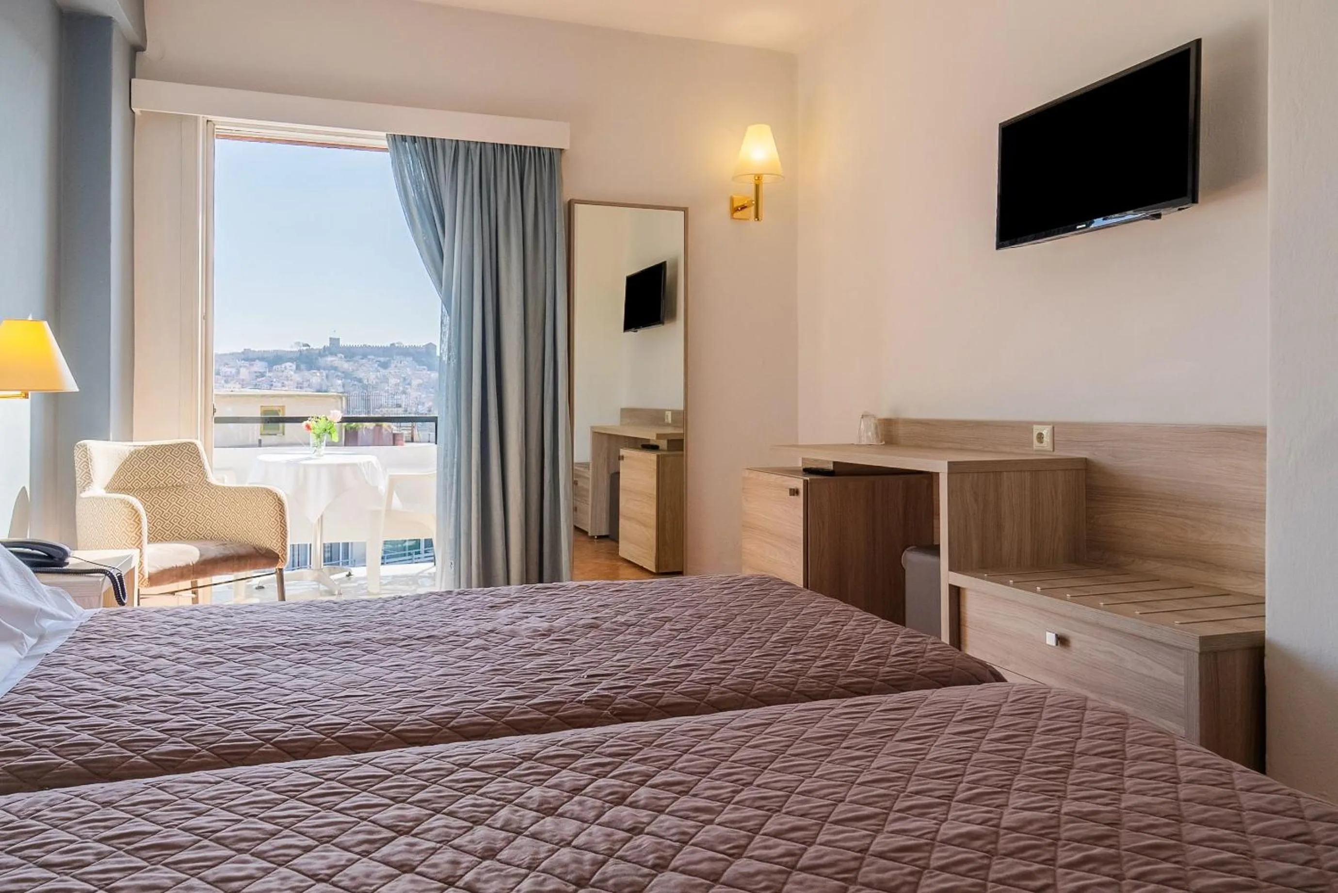 Bed in Oceanis Hotel