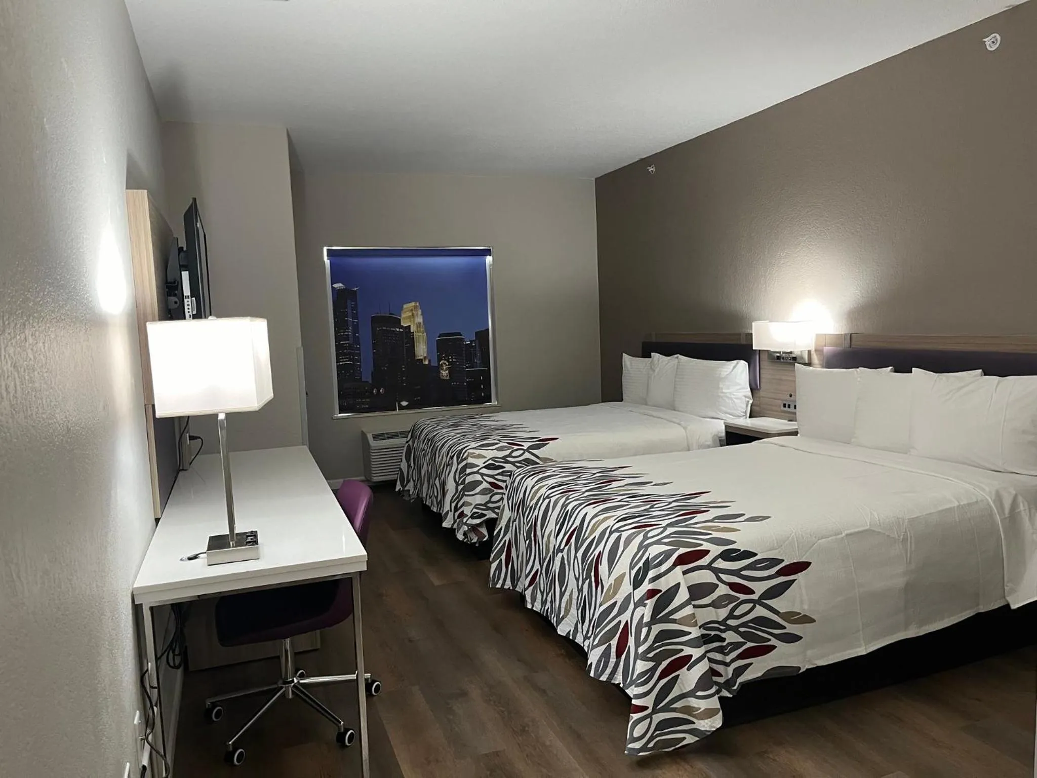 Photo of the whole room, Bed in Quality Suites North IH 35