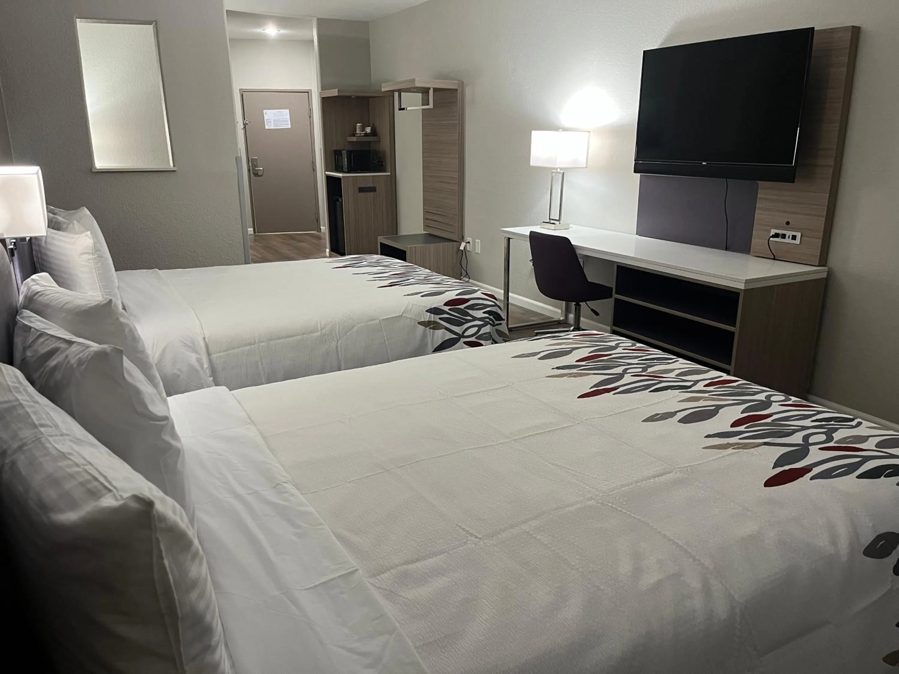 Bed in Quality Suites North IH 35