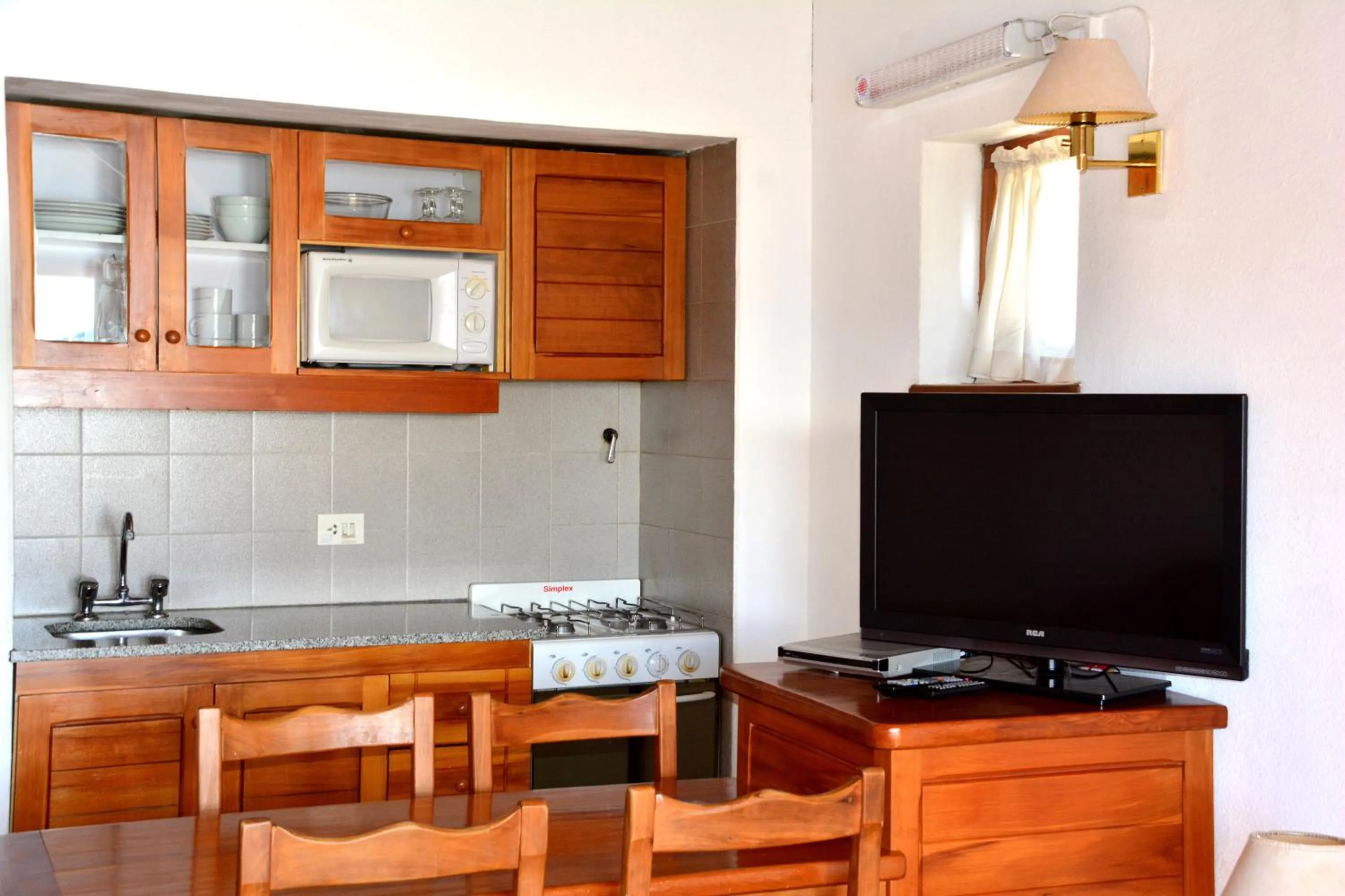 Kitchen or kitchenette in Apart Del Lago